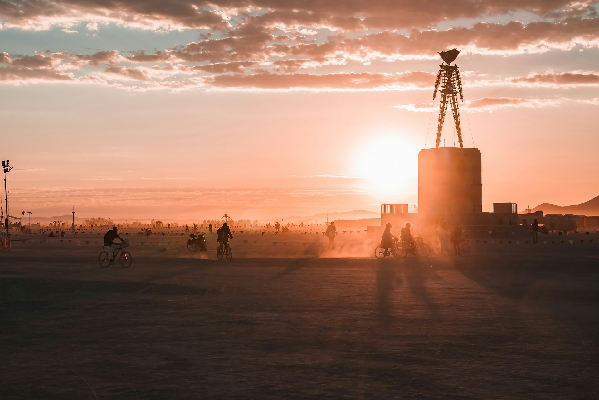 A sculpture in the desert at sunrise at the Burning Man festival, Black Rock Desert, Nevada, USA