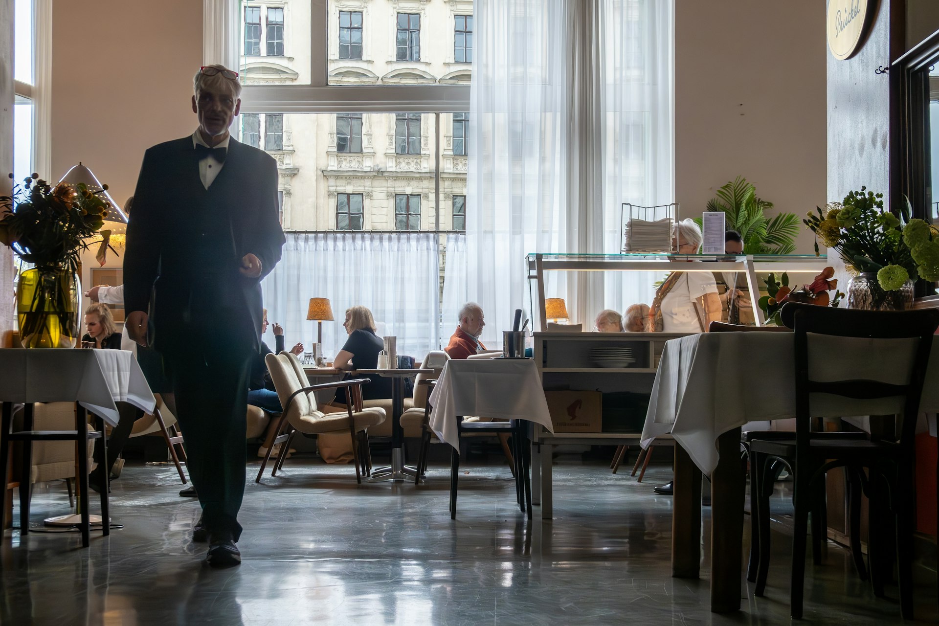  A waiter inside the landmark cafe, Café Prückel, Vienna, Austria