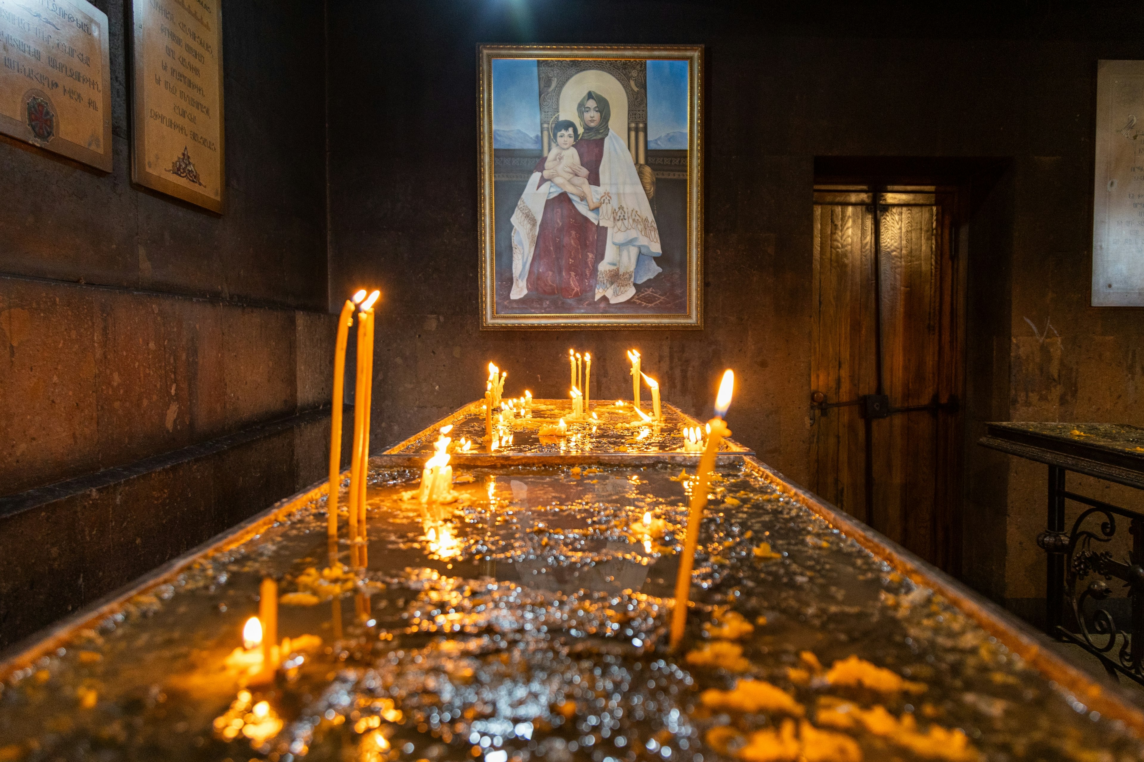 Candles and a religious icon in Saint Sarkis Cathedral, Yerevan, Armenia