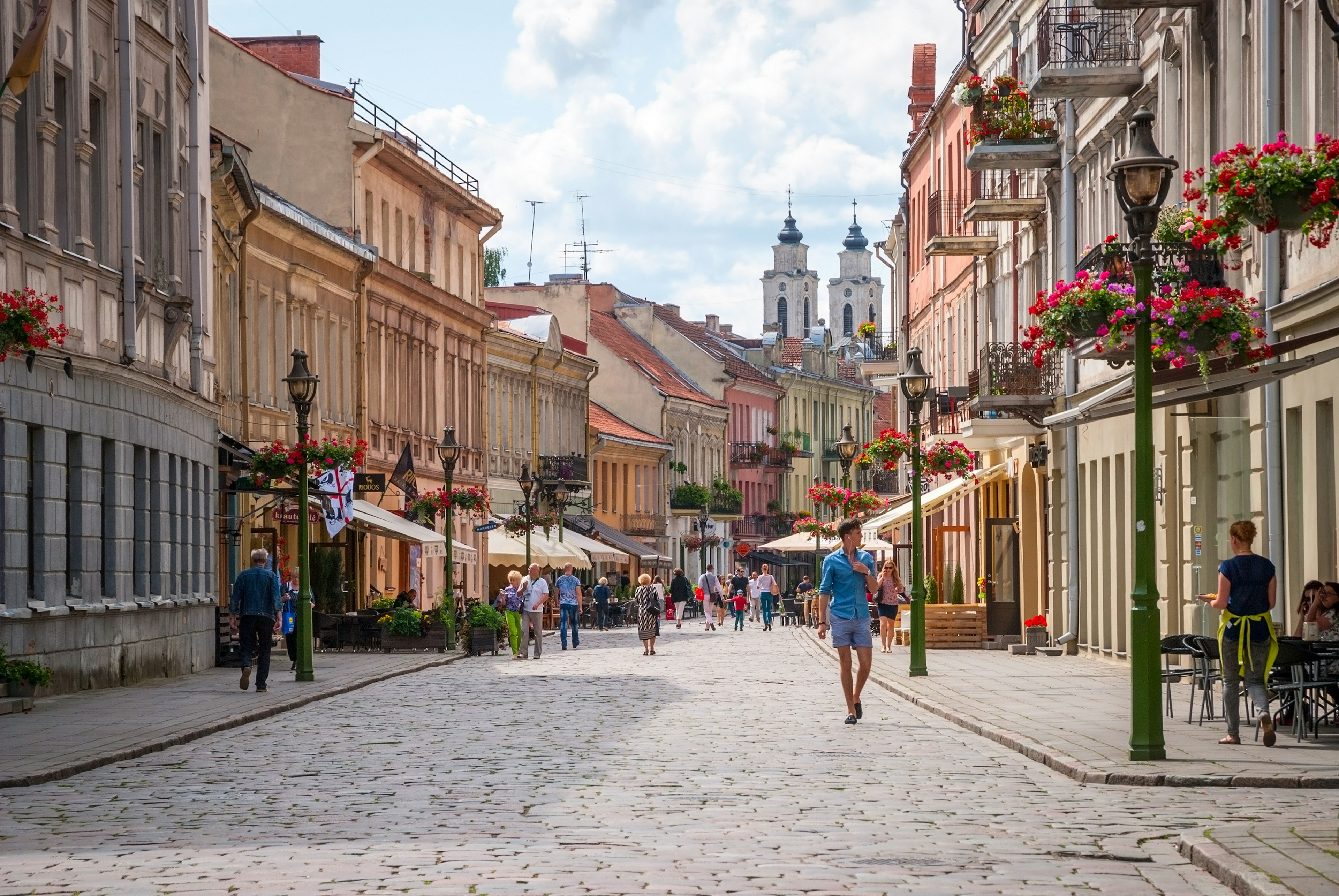 People waking on the street in the historic center of Kaunas, Lithuania