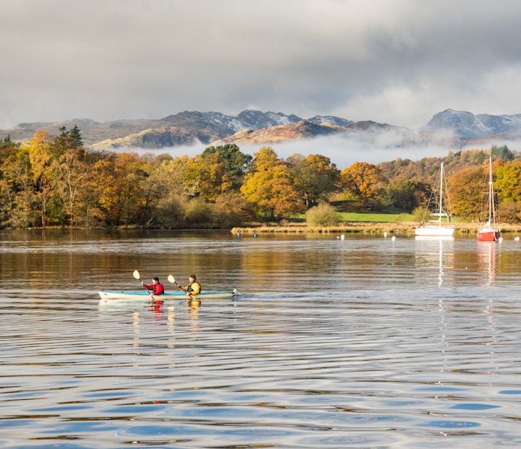 November 12, 2016: Two people paddle a canoe in Windermere lake at Ambleside.
1111423574
ambleside, autumn, boat, bow fell, britain, british, canoe, canoeing, cumbria, england, english, forest, great britain, lake, lake district, lake windermere, landscape, langdale, mist, mountain, national park, nature, recreation, sunny, tree, trees, uk, united kingdom, water, waterhead, windermere, woodland