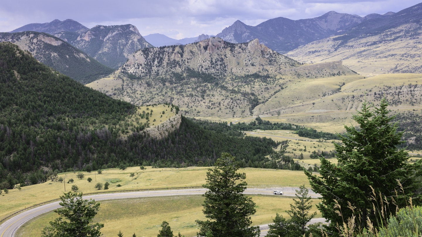 Red Lodge, Montana, USA - View across the rugged undulating landscape of the Beartooth mountains as shot from the Bear Tooth Pass Mountain Highway near Red Lodge, Montana, USA.
america, bear, beartooth, blue, clouds, flowers, grass, highway, hills, landscape, lodge, montana, mountains, pass, pine, red, rocks, scene, scenery, scenic, sky, tooth, trees, undulating, usa, vista, wild, yellow