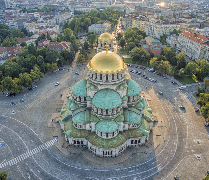 Licensing ID: 13353695, Photo ID: 121116733
Alexander Nevsky Cathedral, Sofia, Sofia Province, Bulgaria, Balkan States, Eastern Europe, Europe, Outdoors, Daytime, City, Urban Scene, View From Above, Cathedral, Place Of Worship, Street, Cityscape, Tree, Road, Byzantine Revival Architecture, Architecture, Nobody, Travel, Travel Destinations
View from above Alexander Nevsky Cathedral in Sofia, Bulgaria