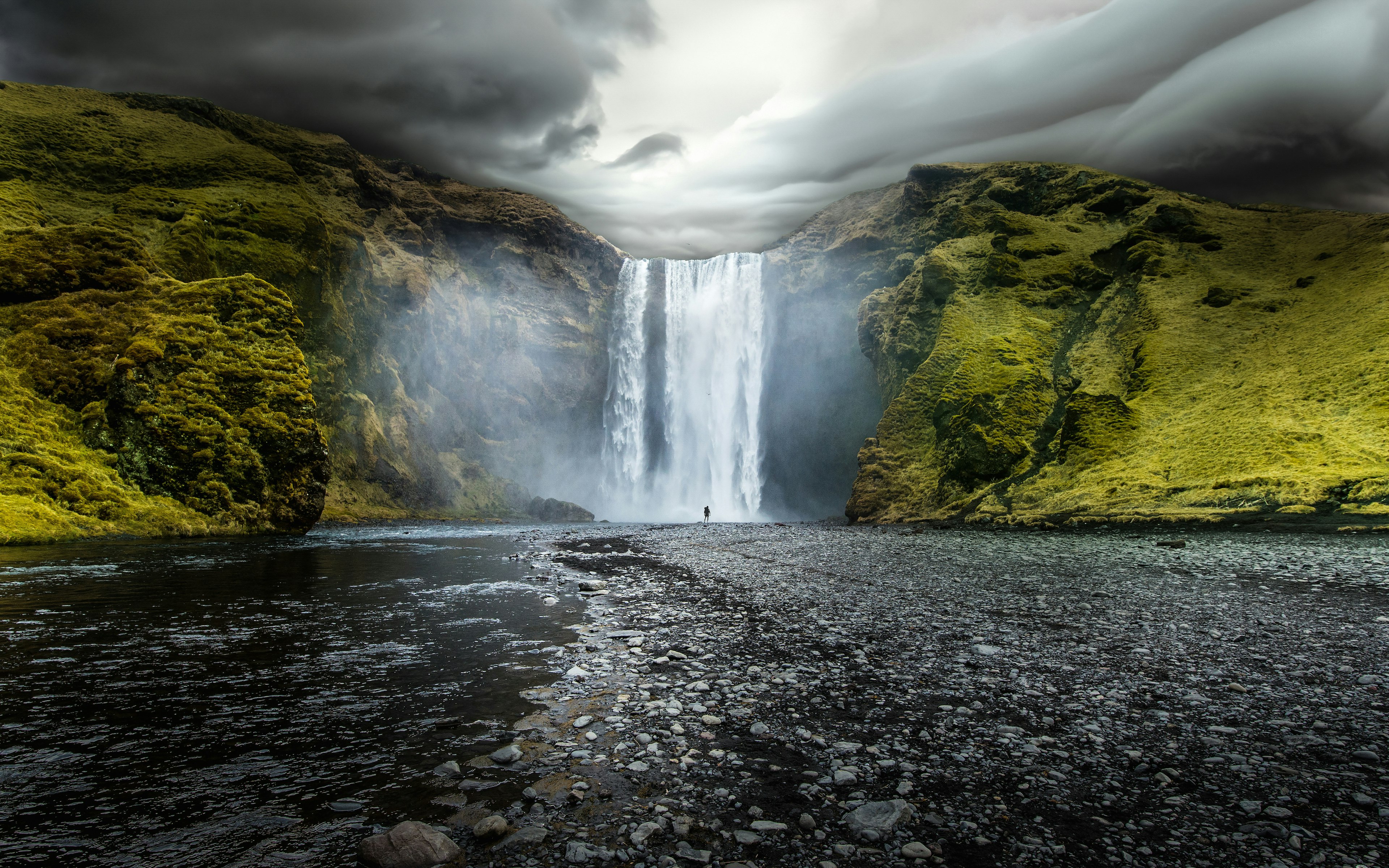 Overcast sky over waterfall