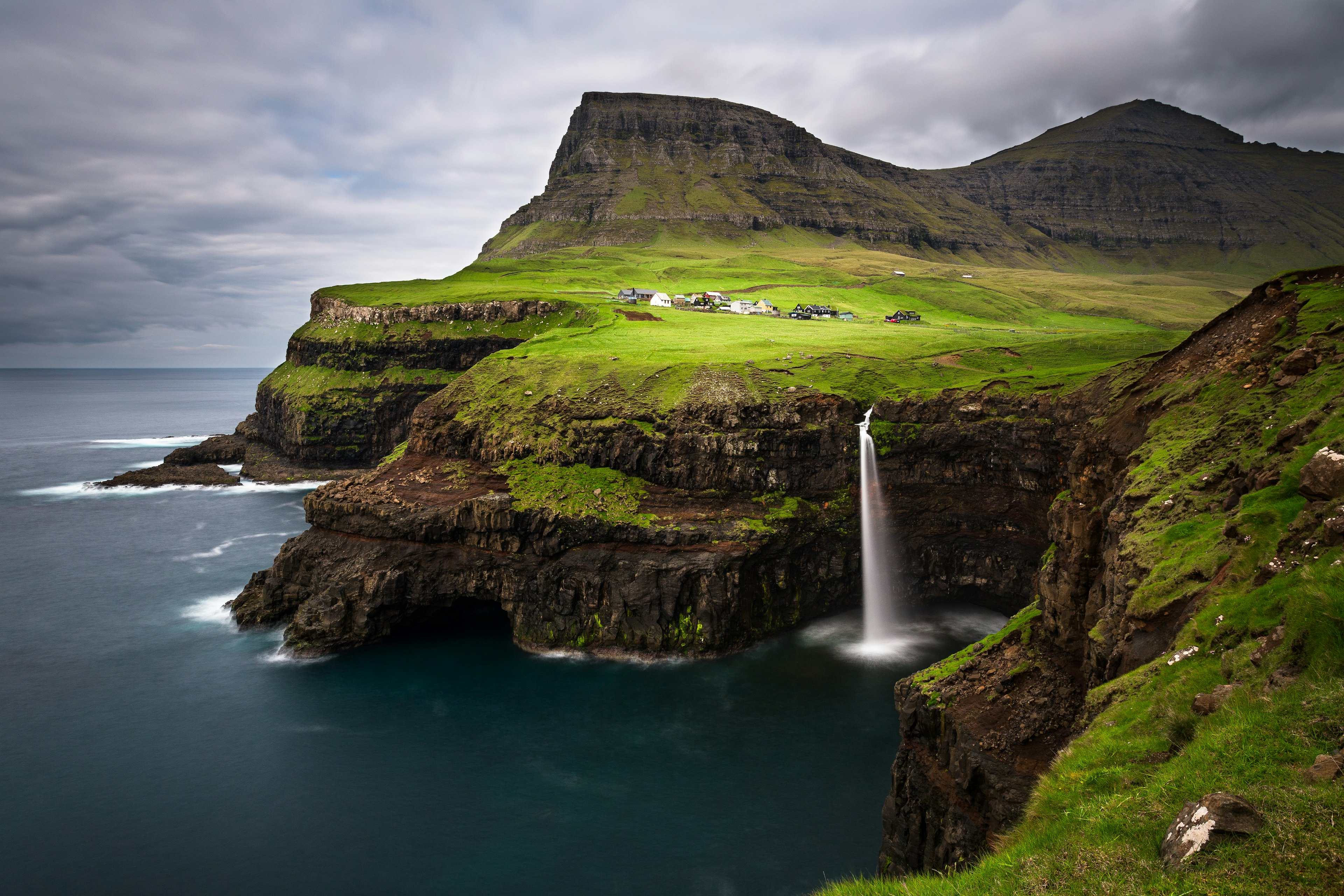 Idyllic island with a waterfall.