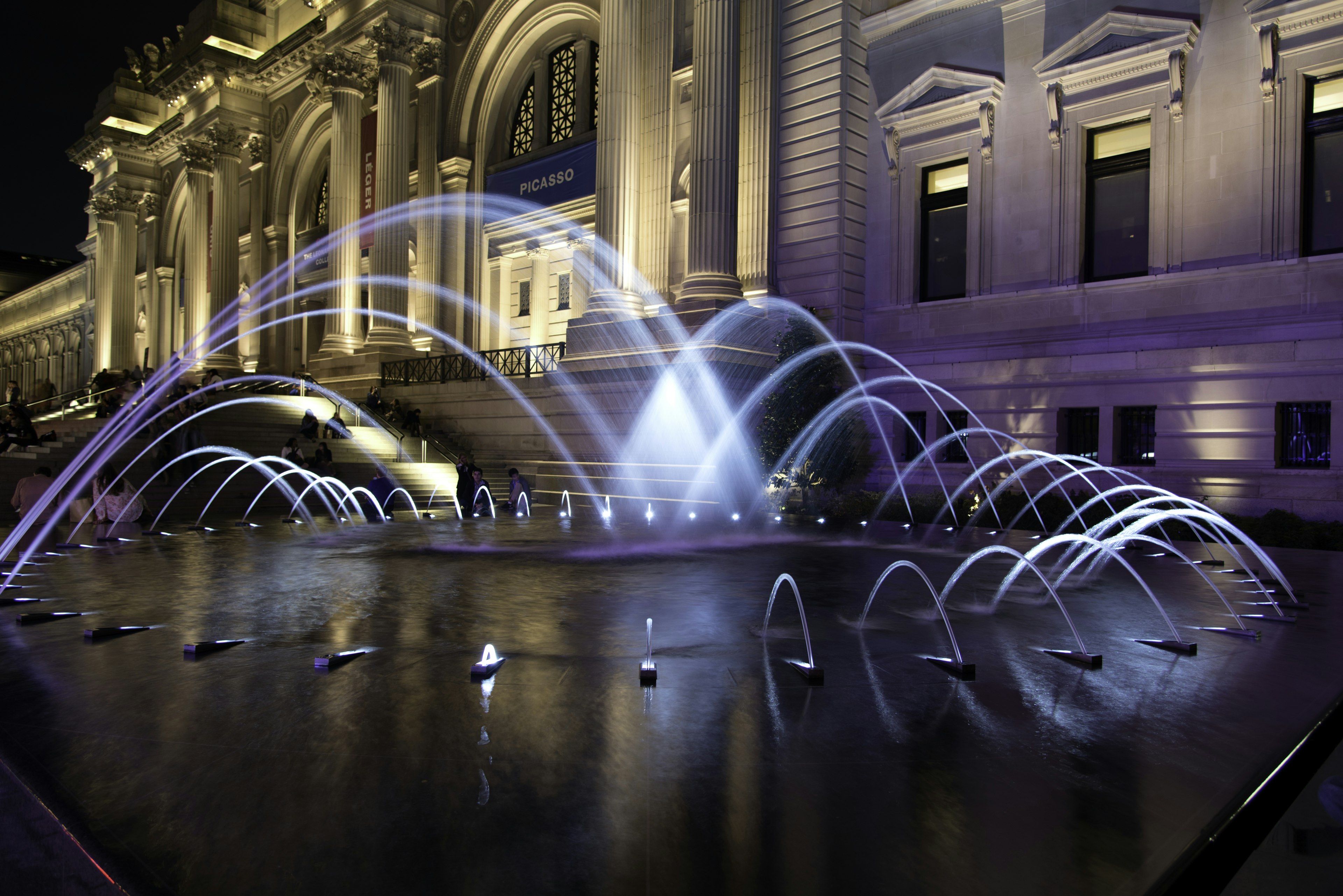 Illuminated fountain at entrance to Metropolitan Museum of Art, New York City, New York State, USA