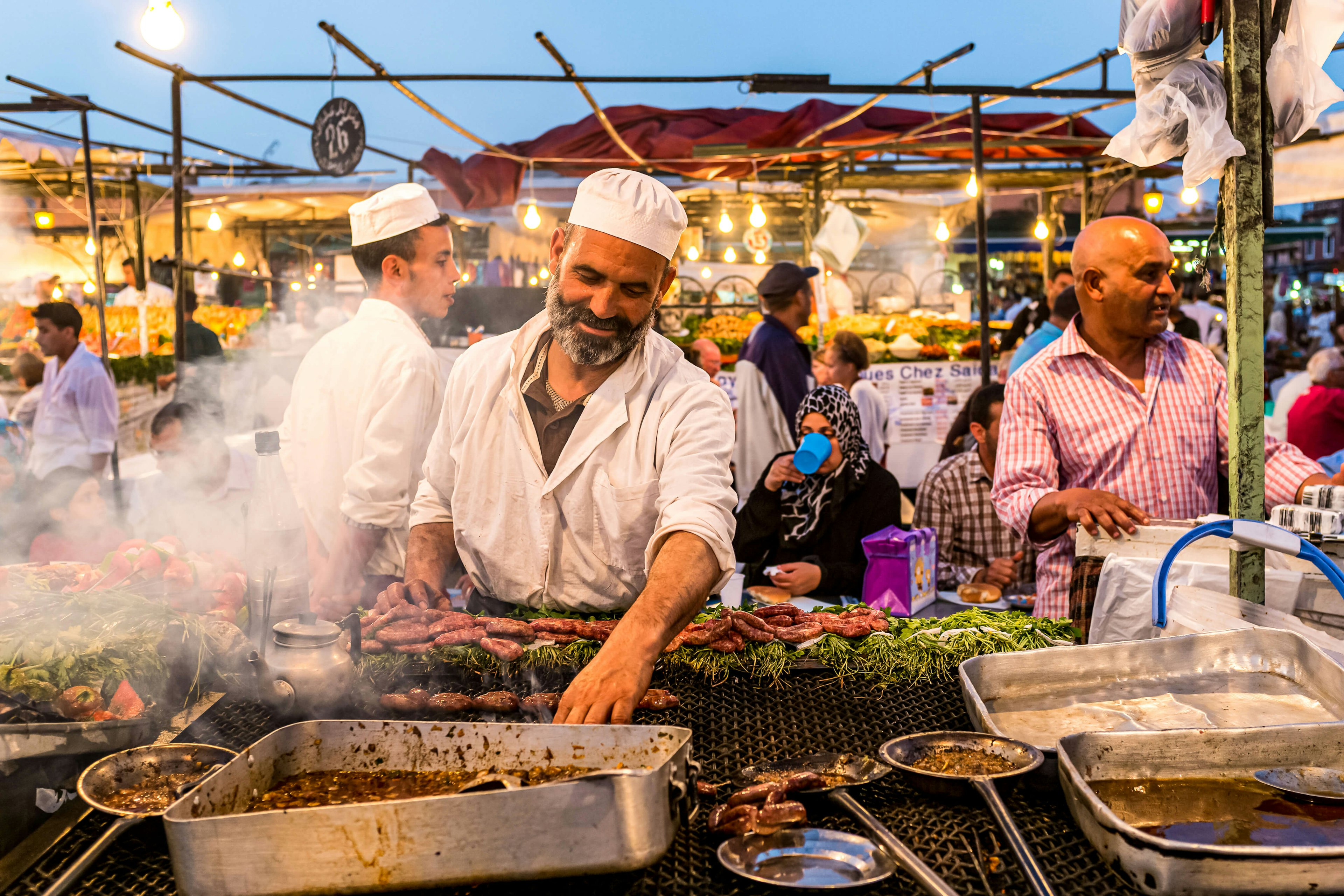 A cook at a food stall in Jemaa el-Fnaa, the main square of Marrakesh, Morocco. Street food stalls in Marrakech’s Djemaa el Fna square Glen Berlin shutterstock_1893472411 rfc.jpg