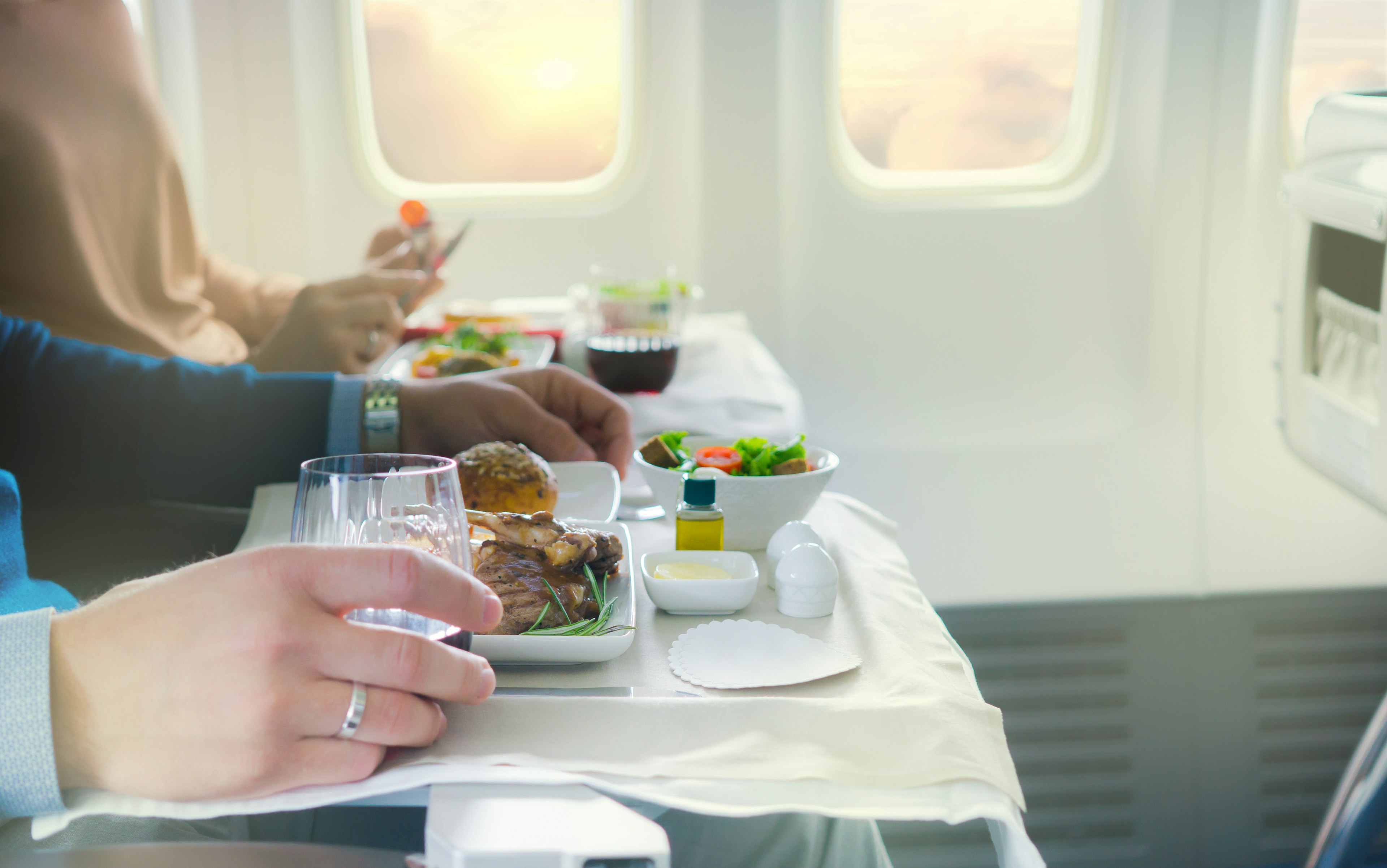 Tasty meal served on board of airplane on the table