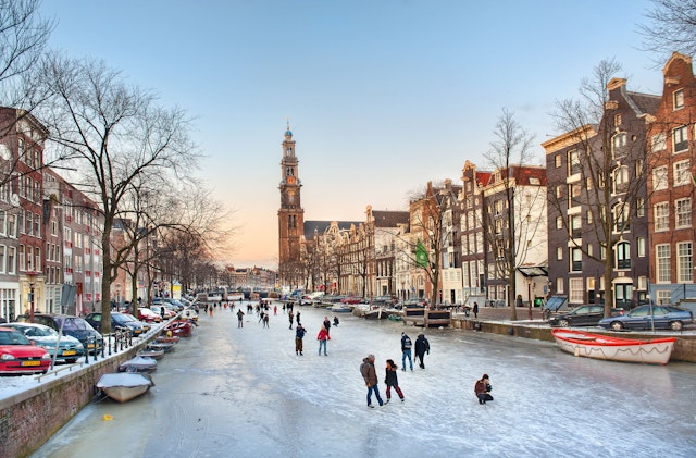 Skaters on the iced-over canals of Amsterdam, the Netherlands