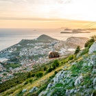 The Dubrovnik cable car decends Mount Srd during sunset.
JEBBCB
Adriatic, Balkans, Blue, Croatia, Srd, Srd Mountain, Summer, Tourists, View, Visitors, Lift, Gondola, Sunset view, Vantage point, Mount Srd, Dalmatia, Old Town, Old City, Old City of Dubrovnik, Adriatic Sea, best views of Dubrovnik, Adriatic Coastline, panoramic views, Mediterranean port cities and towns in Croatia