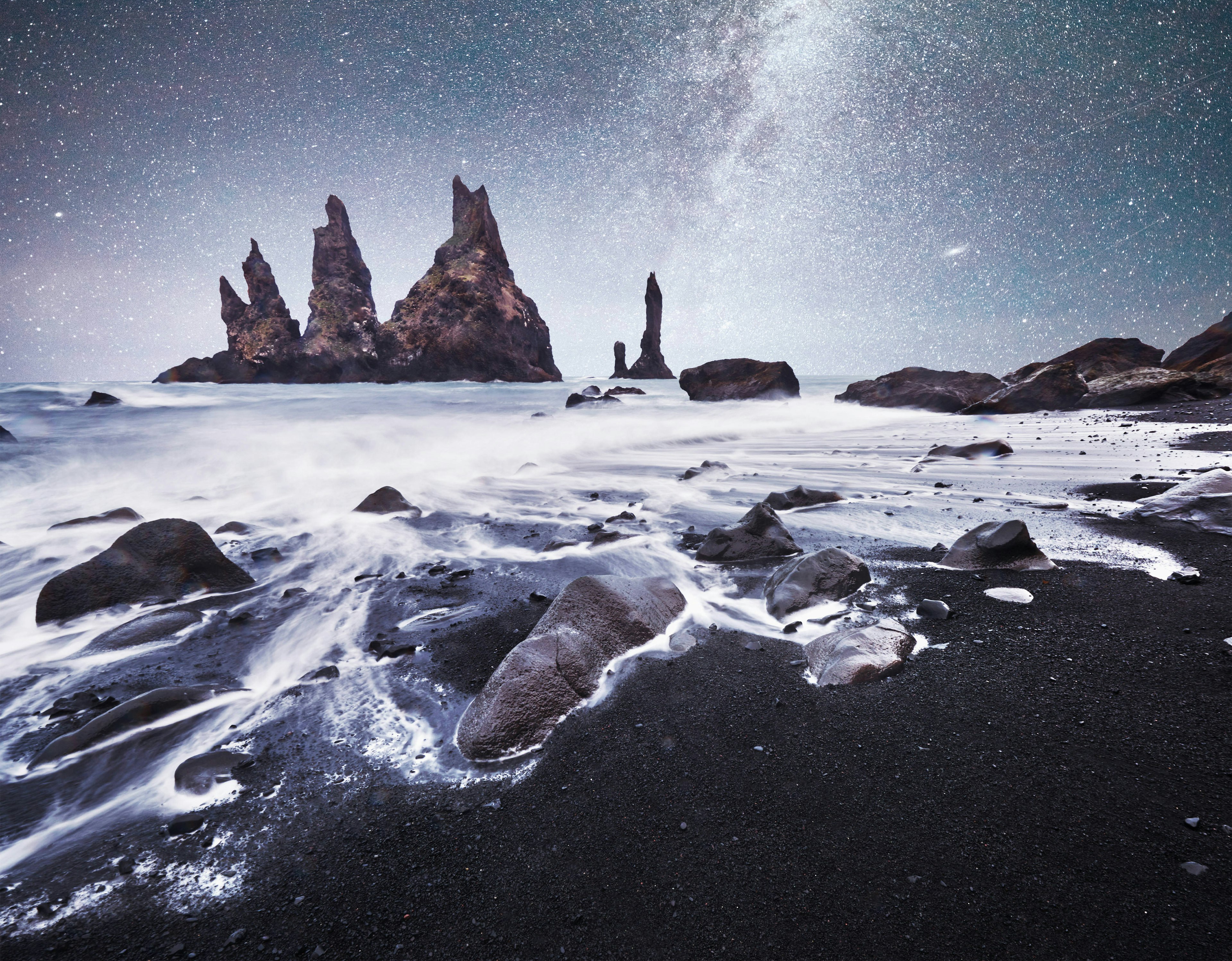 Icebergs floating in Jokulsarlon glacial lake. South Iceland. Lagoon. Starry sky night. Fantastic milky way.