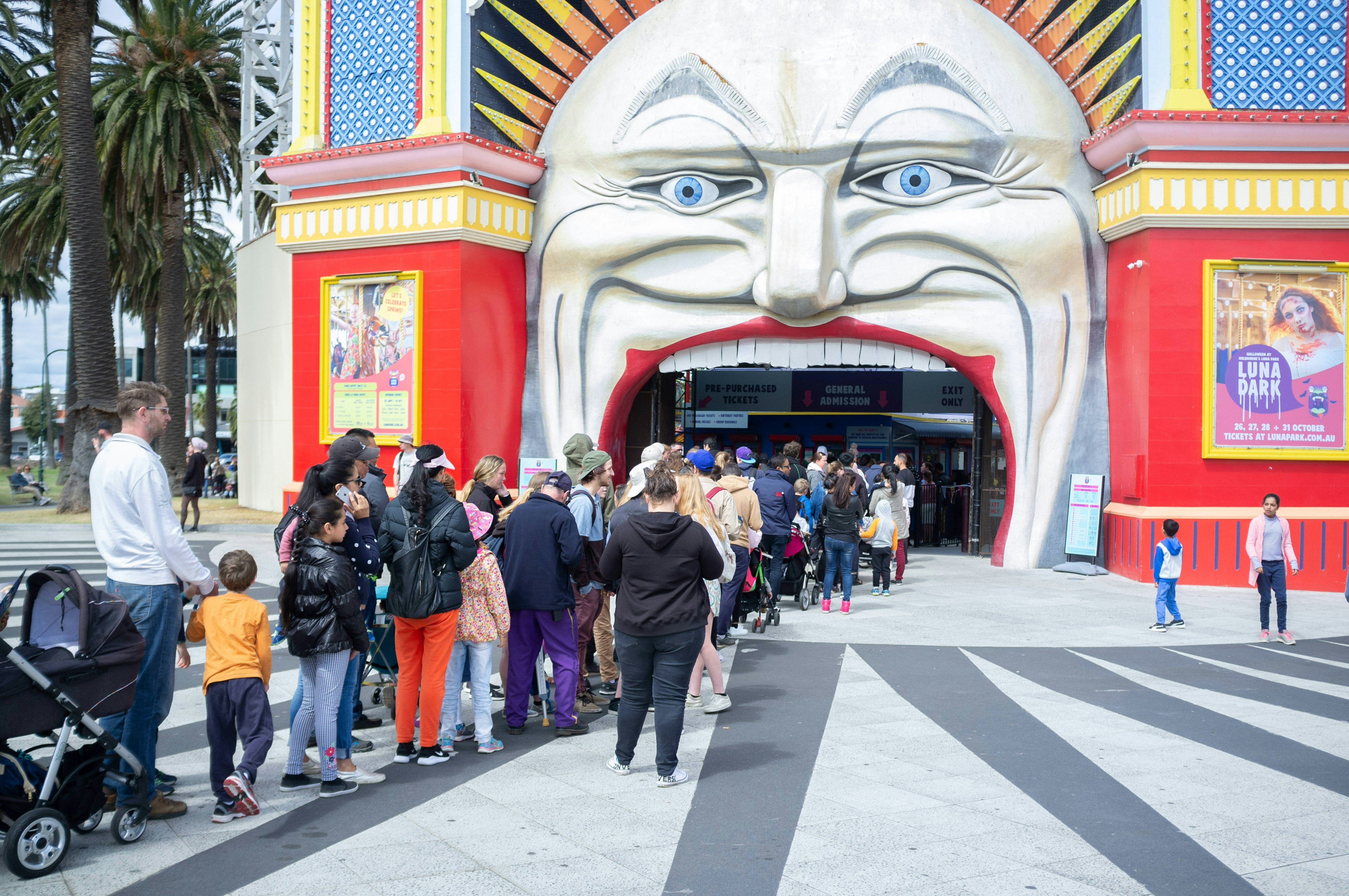 People waiting in line to Luna Park entrance in St. Kilda Melbourne