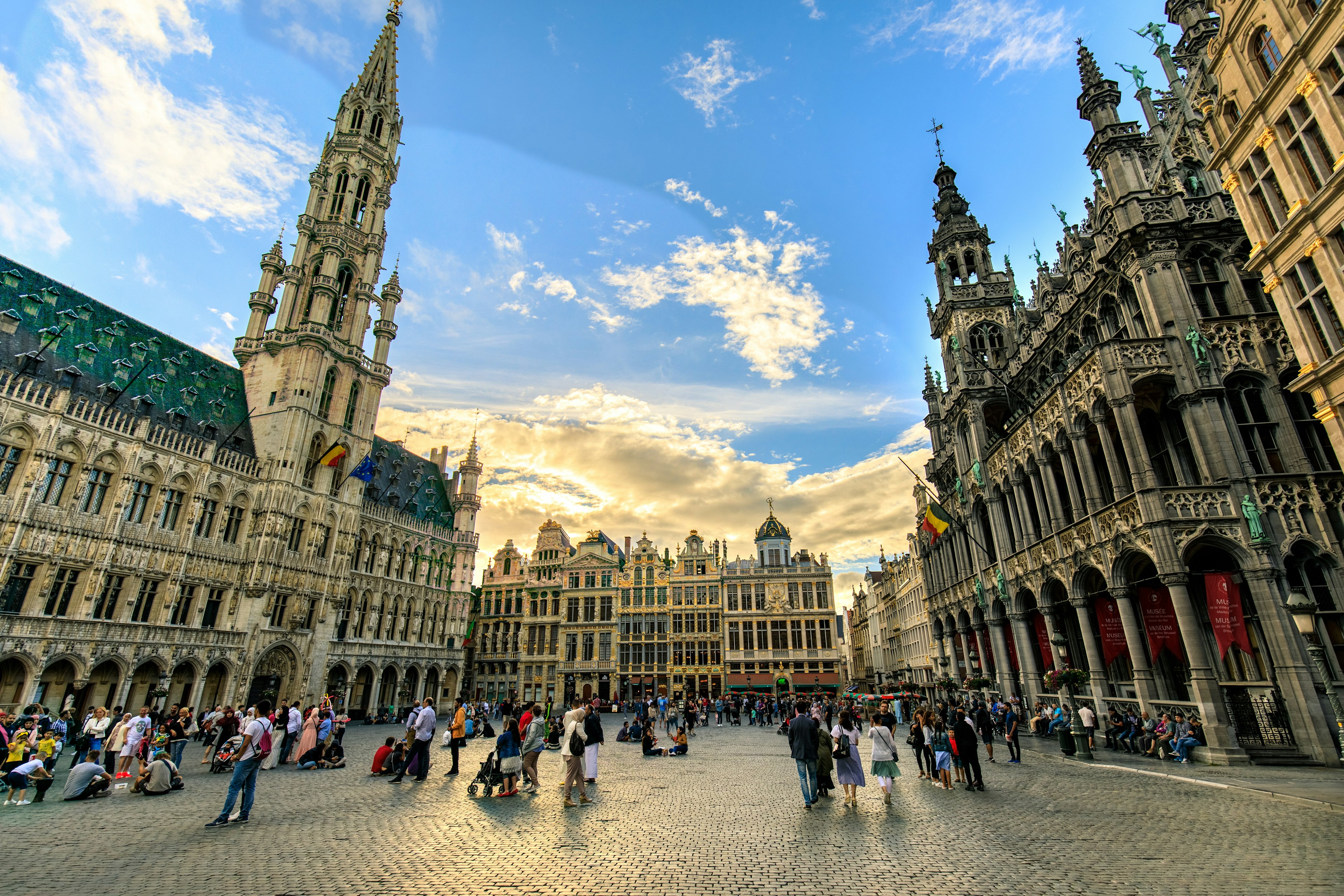 Tourists on the open square of the Grand Place in Brussels, Belgium