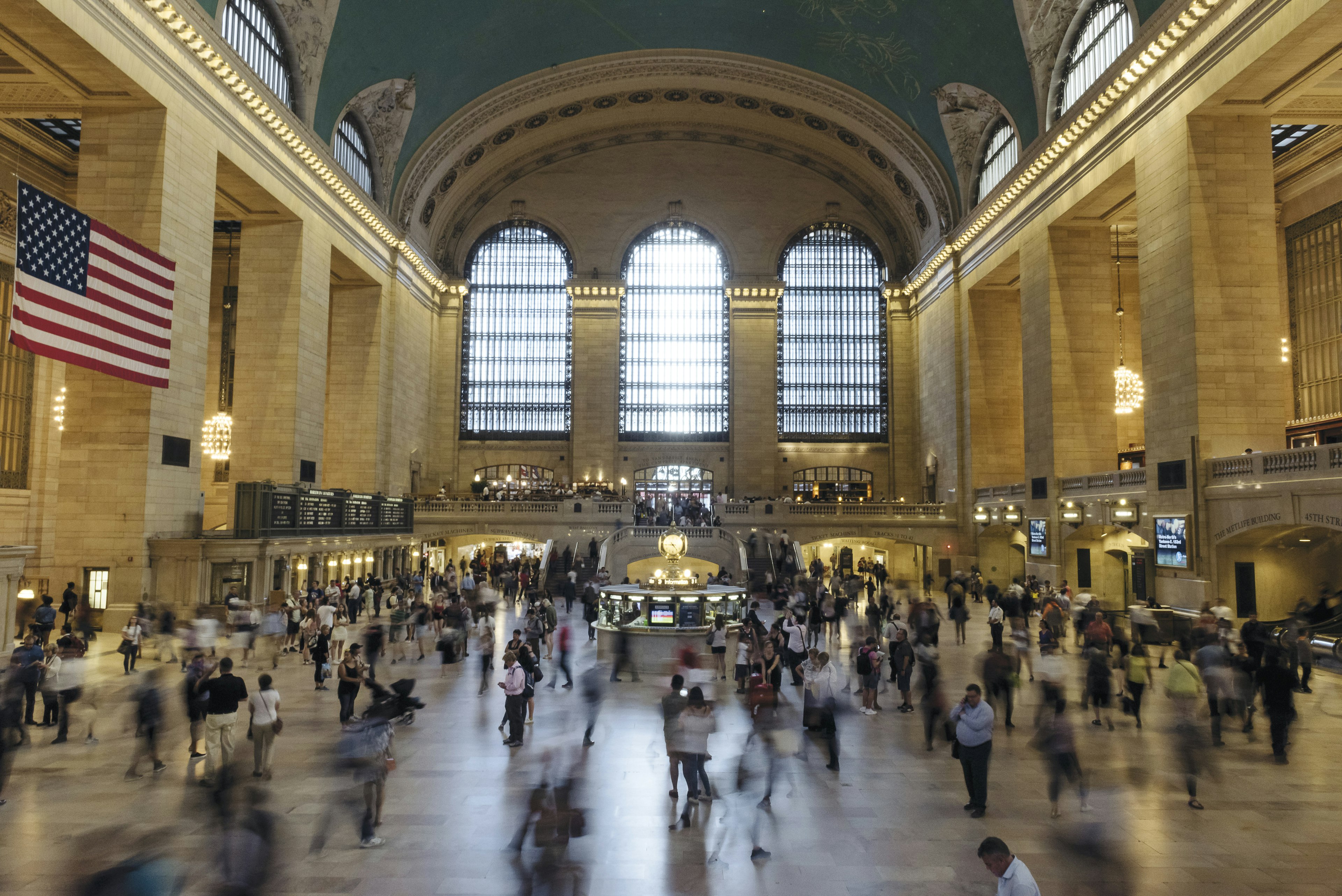 Passengers walk around Grand Central Terminal station