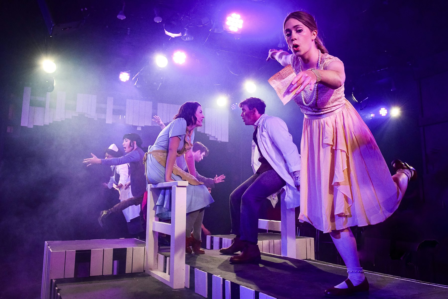 Performers singing in the musical Alice by Heart at Chopin Theatre.