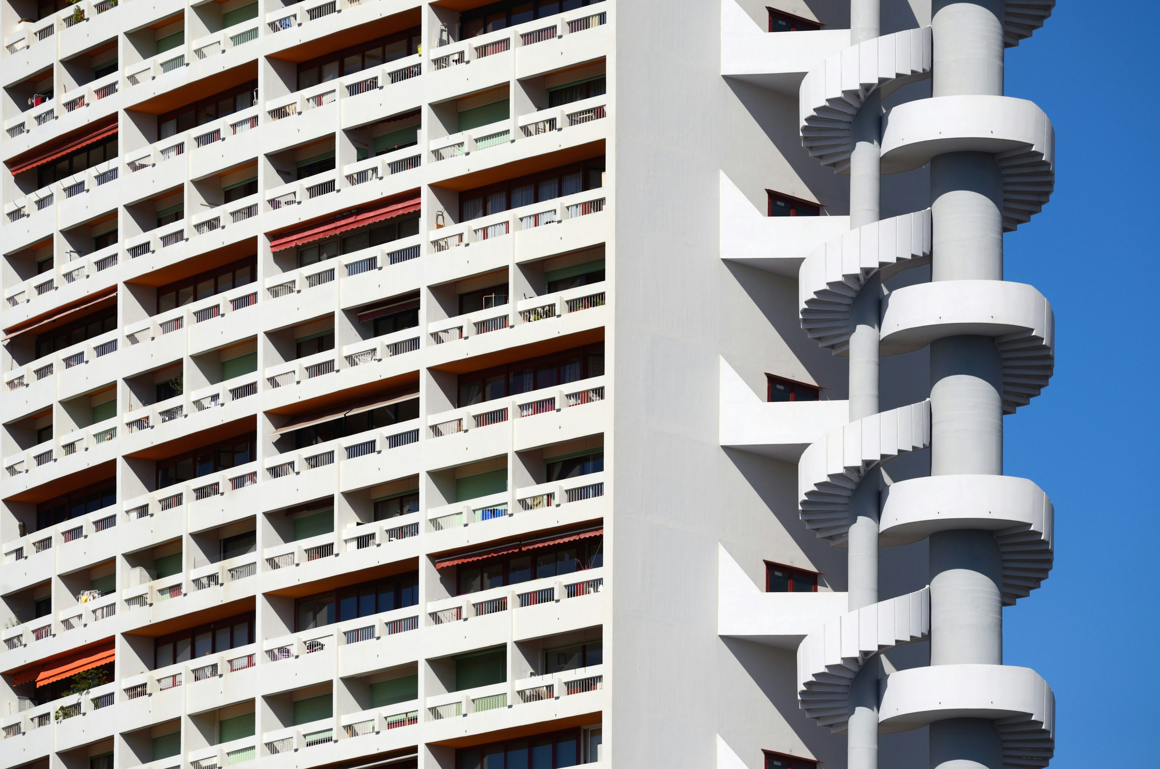 Spiral staircase and modernist apartment in Marseille, inspired by Cité Radieuse