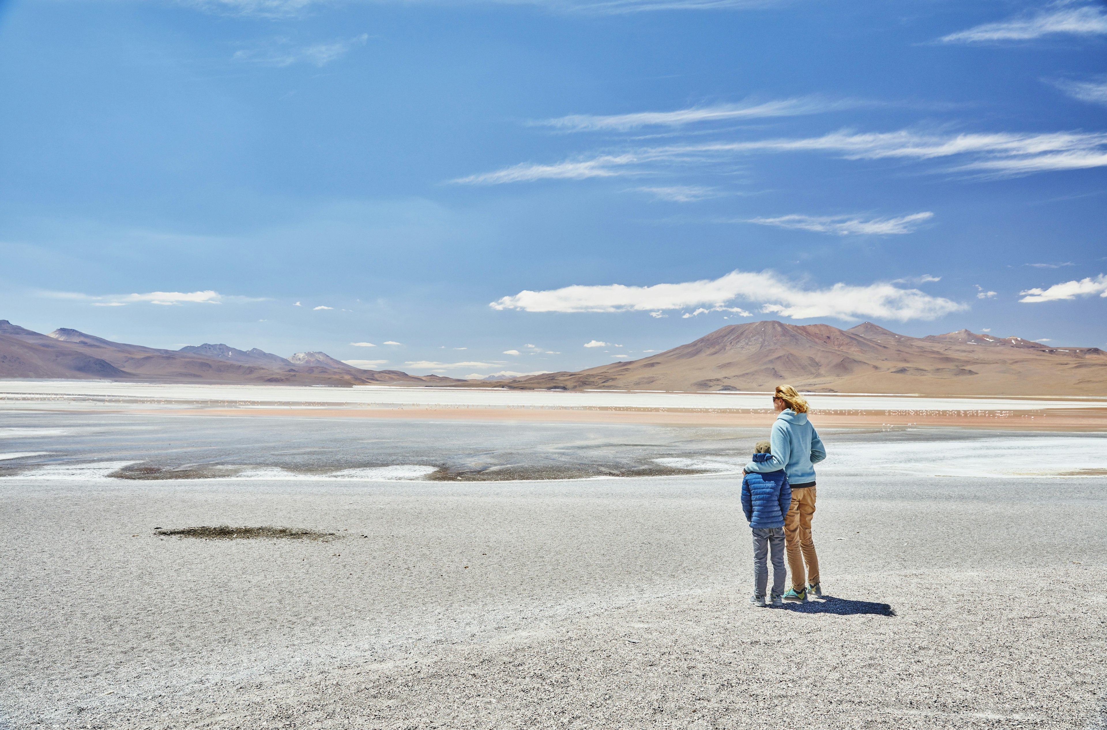 A family looking at the Laguna Colorada, Bolivia