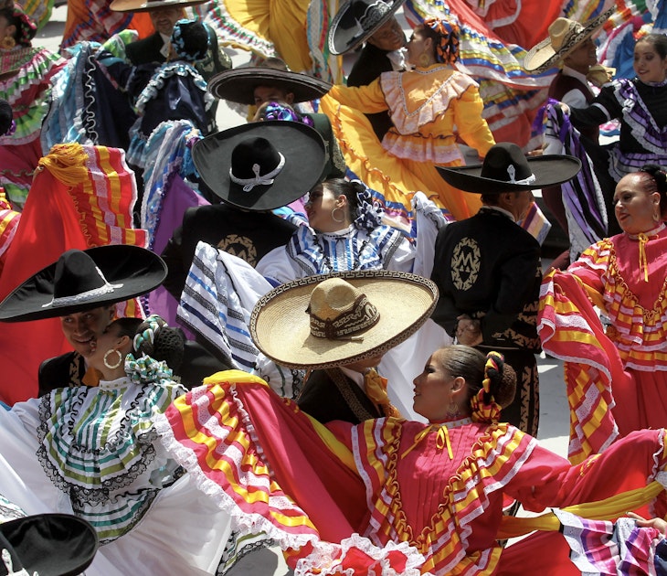 Couples dance to Mariachi traditional music to break the Guinness World Record of largest Mexican folk dance in Guadalajara, Jalisco state, Mexico, on August 24, 2019. - 882 people danced to Mariachi music at the start of the 26th Mariachi International Festival. (Photo by Ulises Ruiz / AFP) (Photo credit should read ULISES RUIZ/AFP via Getty Images)
1163753400
dance, Horizontal
Couples dance to Mariachi traditional music to break the Guinness World Record of largest Mexican folk dance in Guadalajara, Jalisco state, Mexico, on August 24, 2019. - 882 people danced to Mariachi music at the start of the 26th Mariachi International Festival.