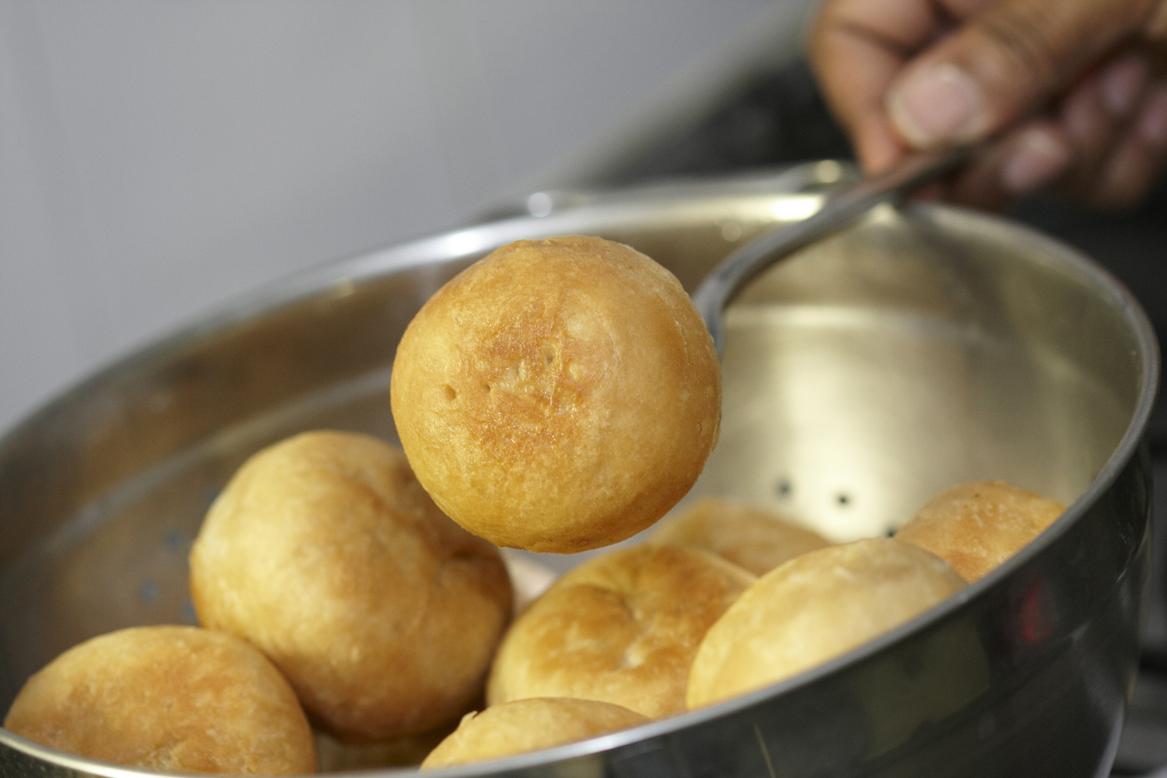 West Indian Johnny Cakes Being prepared And Cokked