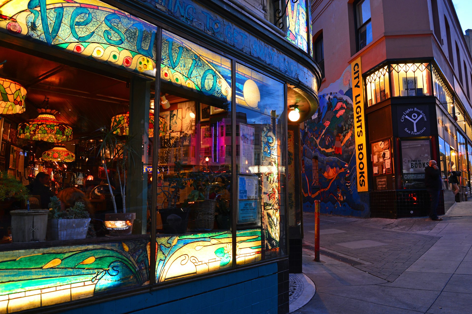 City Lights Bookstore and Vesuvio Cafe stand next to each other as landmarks of the Beat Generation in San Francisco