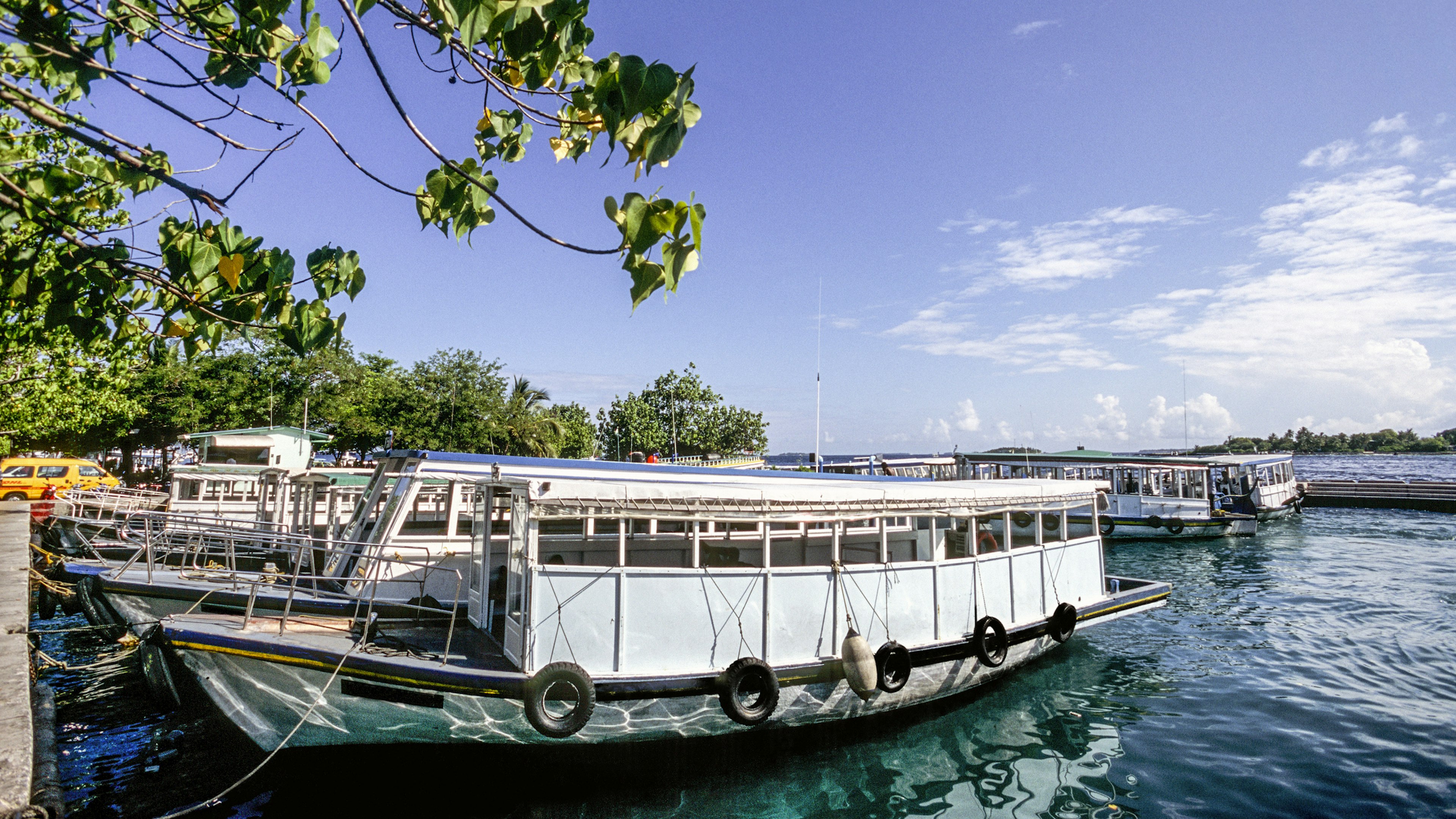 Maldives, North Malé atoll, passenger ferry dhoni boats in harbour