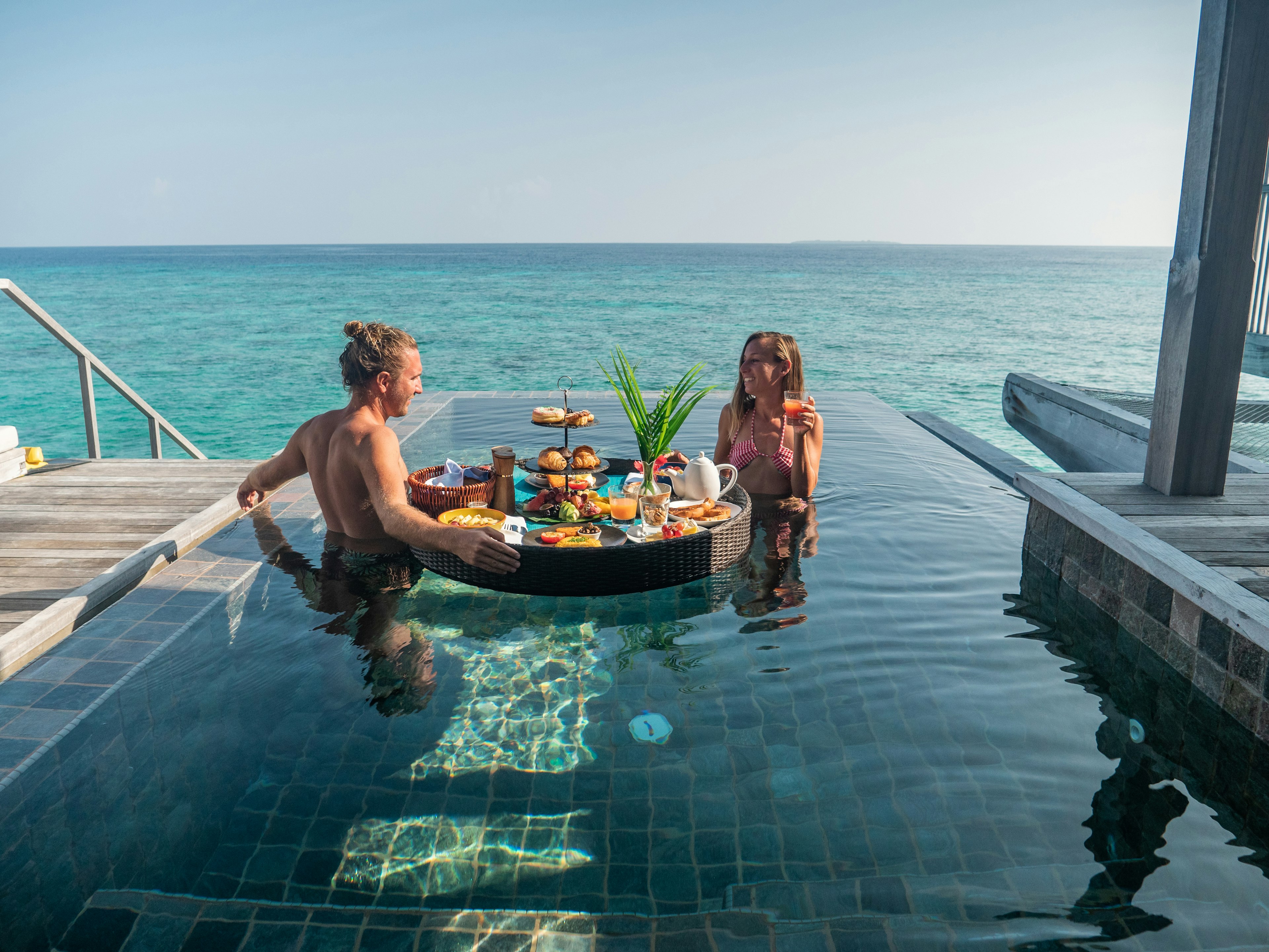 A floating breakfast in a private overwater bungalow