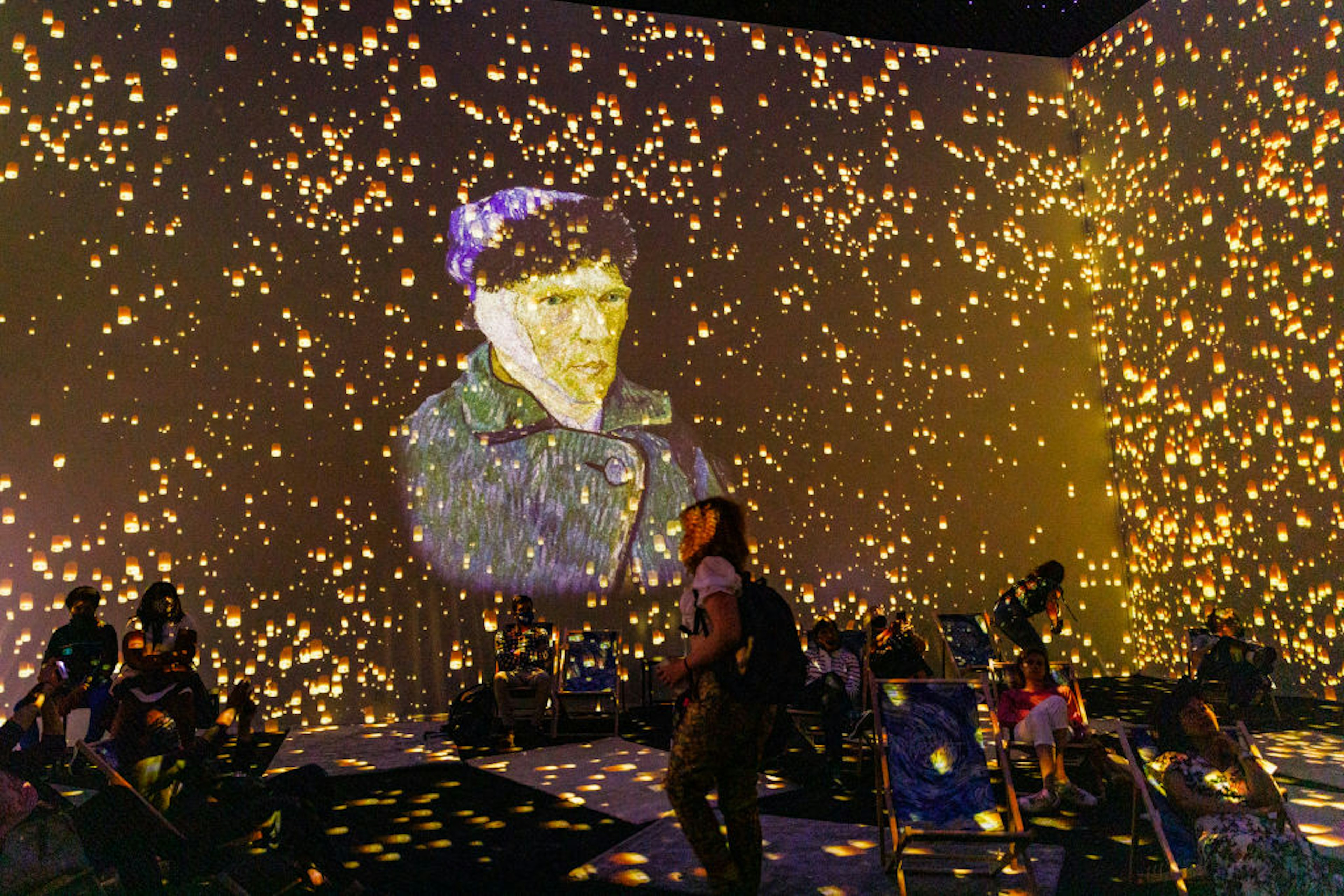 LONDON, ENGLAND - JULY 29: Visitors watch the immersive exhibition during the "Van Gogh: The Immersive Experience" press preview at Old Truman Brewery on July 29, 2021 in London, England. (Photo by Tristan Fewings/Getty Images)
1331288571