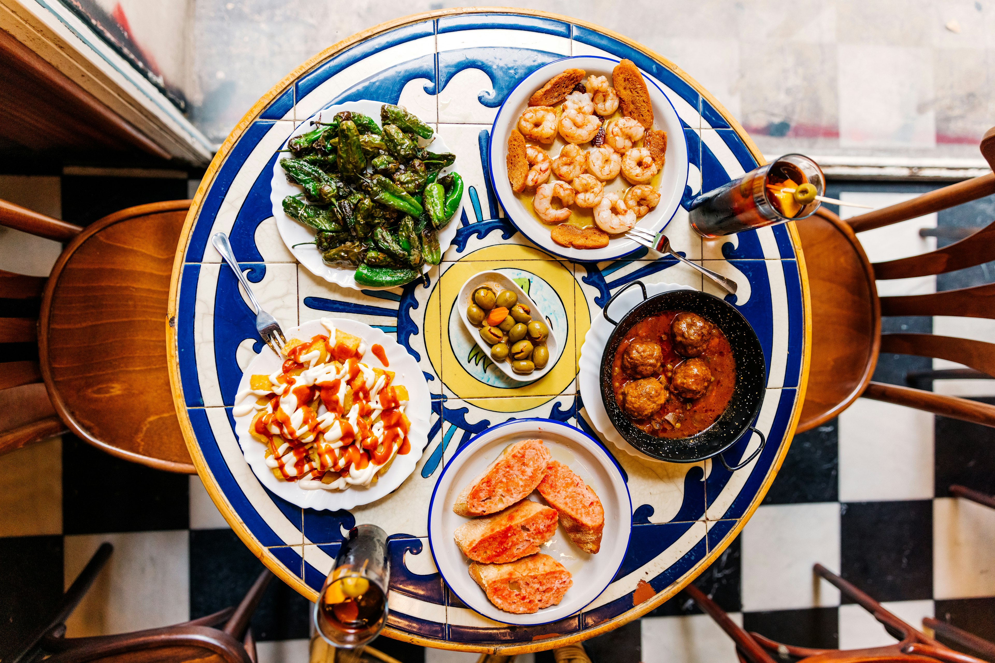 Various tapas served in a tapas bar, directly above view