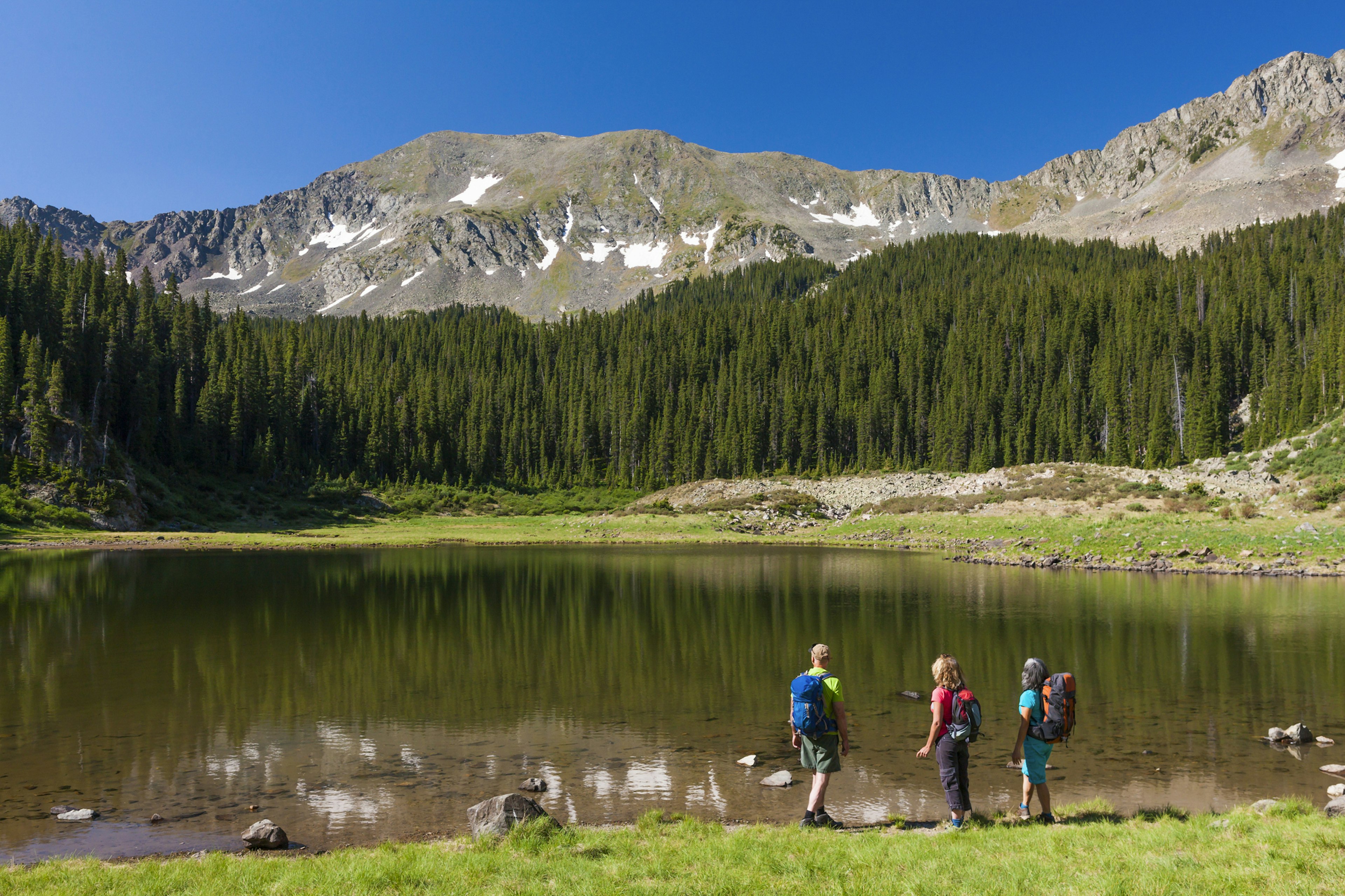 Hikers beside Williams Lake, New Mexico