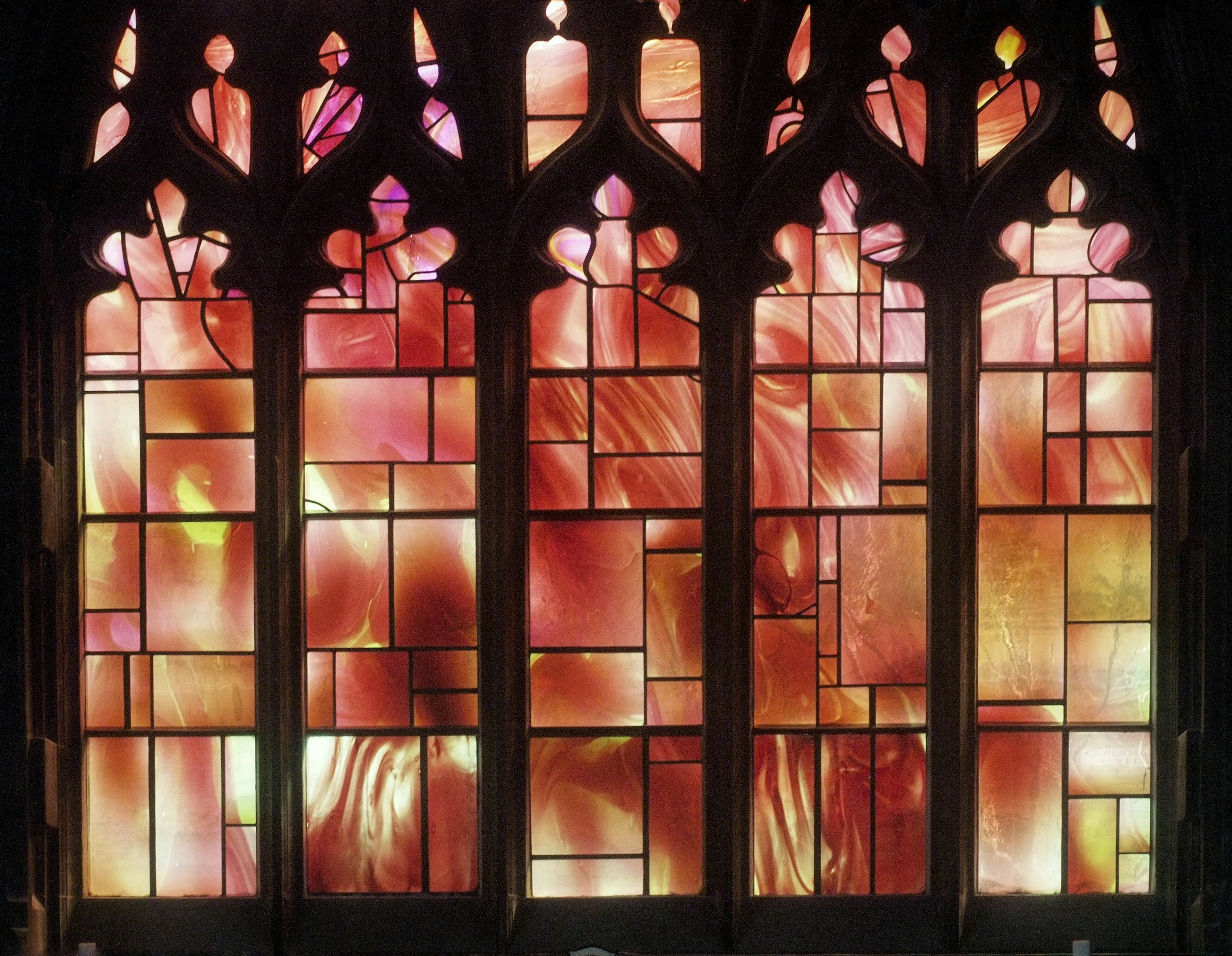 Detail of “Fire Window” commemorating the Blitz of WWII at Manchester Cathedral, which was built in the Gothic style in the 15th century