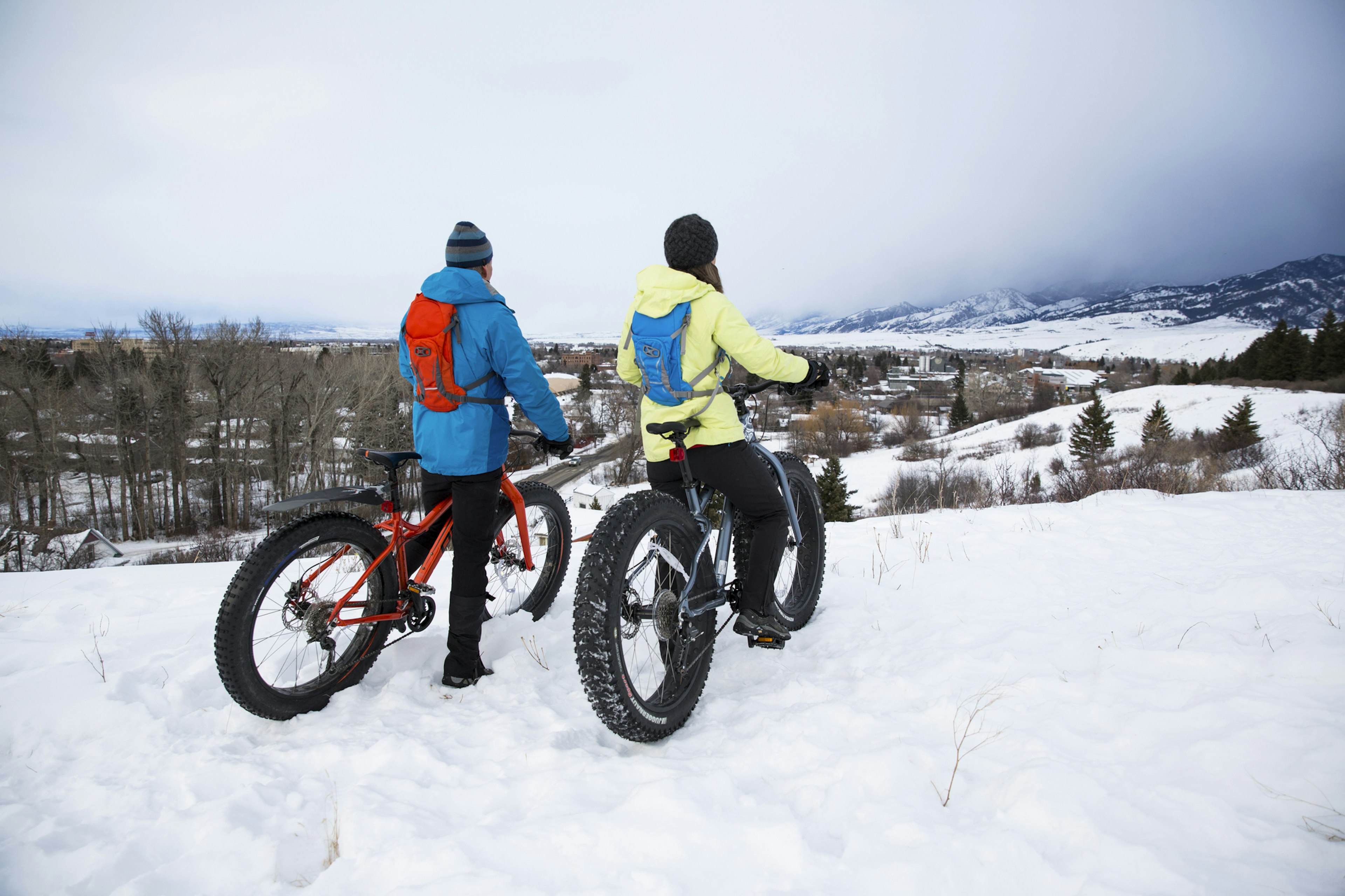 Biking on the snow is a novel way to explore Montana in winter. Jordan Siemens/Getty Images