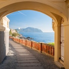 Glimpse of a route in Bogliasco, near Genoa; the promontory of Portofino in the background
638421034
Mediterranean Countries, Genoa - Italy, Personal Perspective, Looking Through Window, Seascape, Headland, Looking, Scenics, Arch, Outdoors, Portofino, Liguria, Italy, Sky, Mediterranean Sea, Sea, Corridor, Single Lane Road, Street, Road, Footpath, Thoroughfare, Bogliasco, Sunny
ONE TIME USE