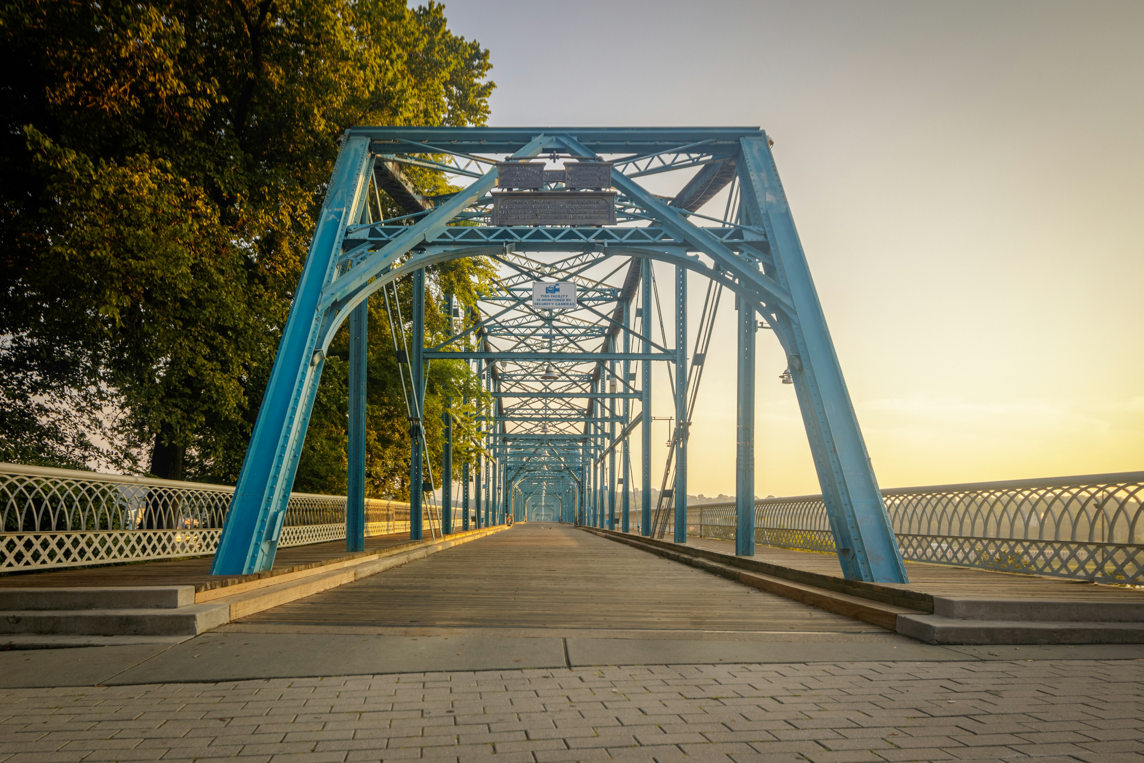 An iron and wood bridge over a river