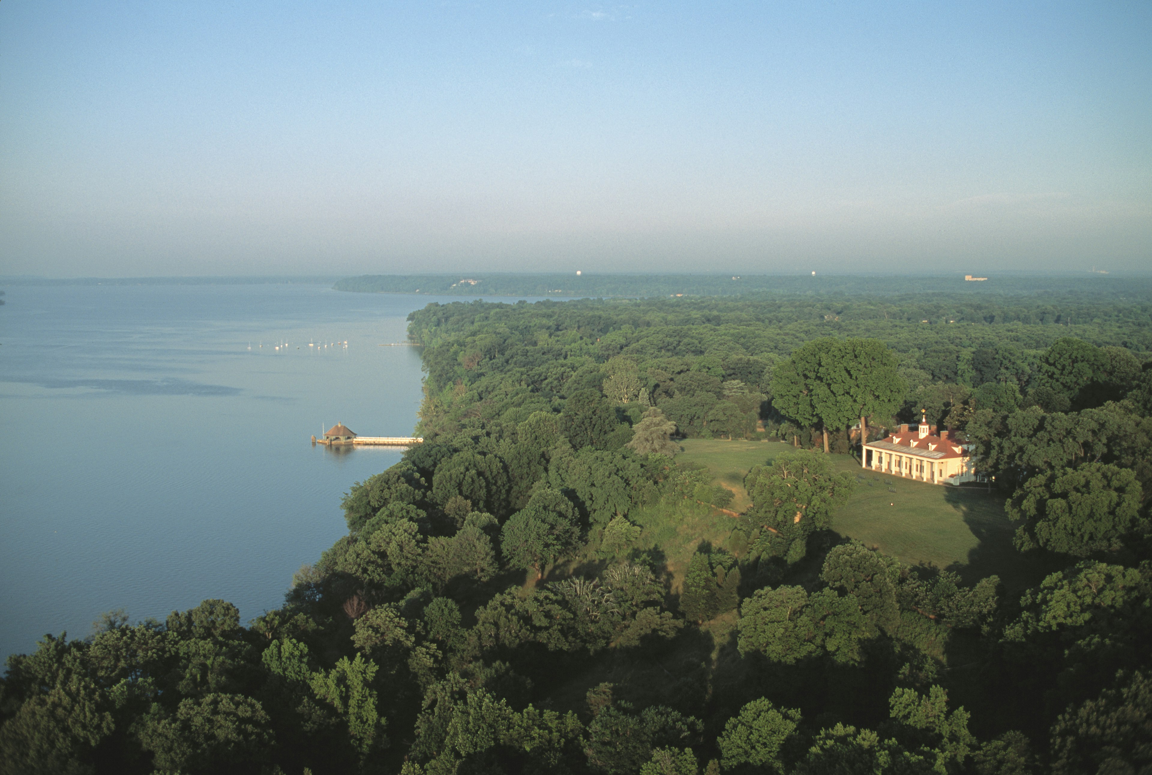 An aerial view of George Washington’s home, Mount Vernon, with woods and Potomac River