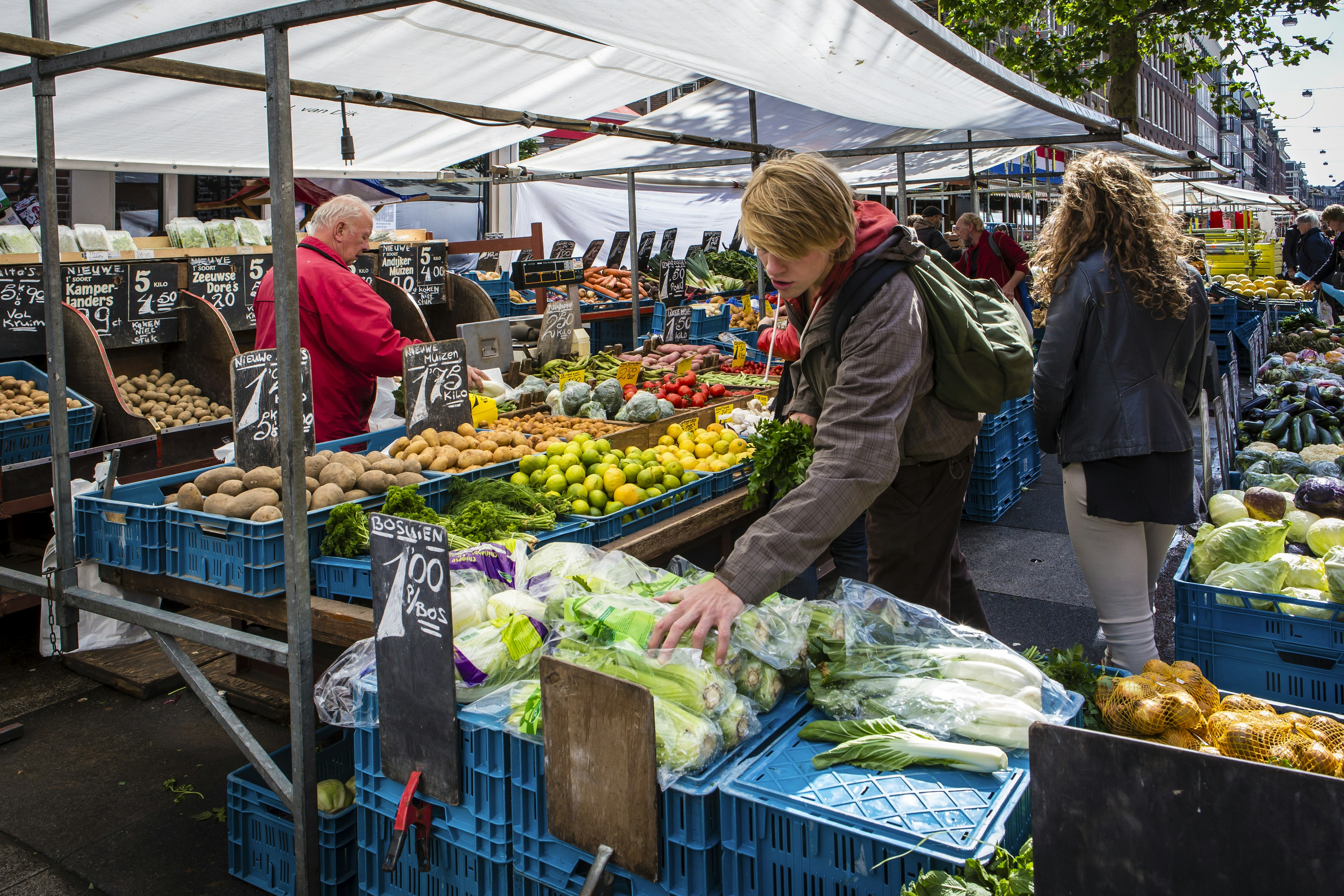 People at a market stall at Albert Cuypmarkt