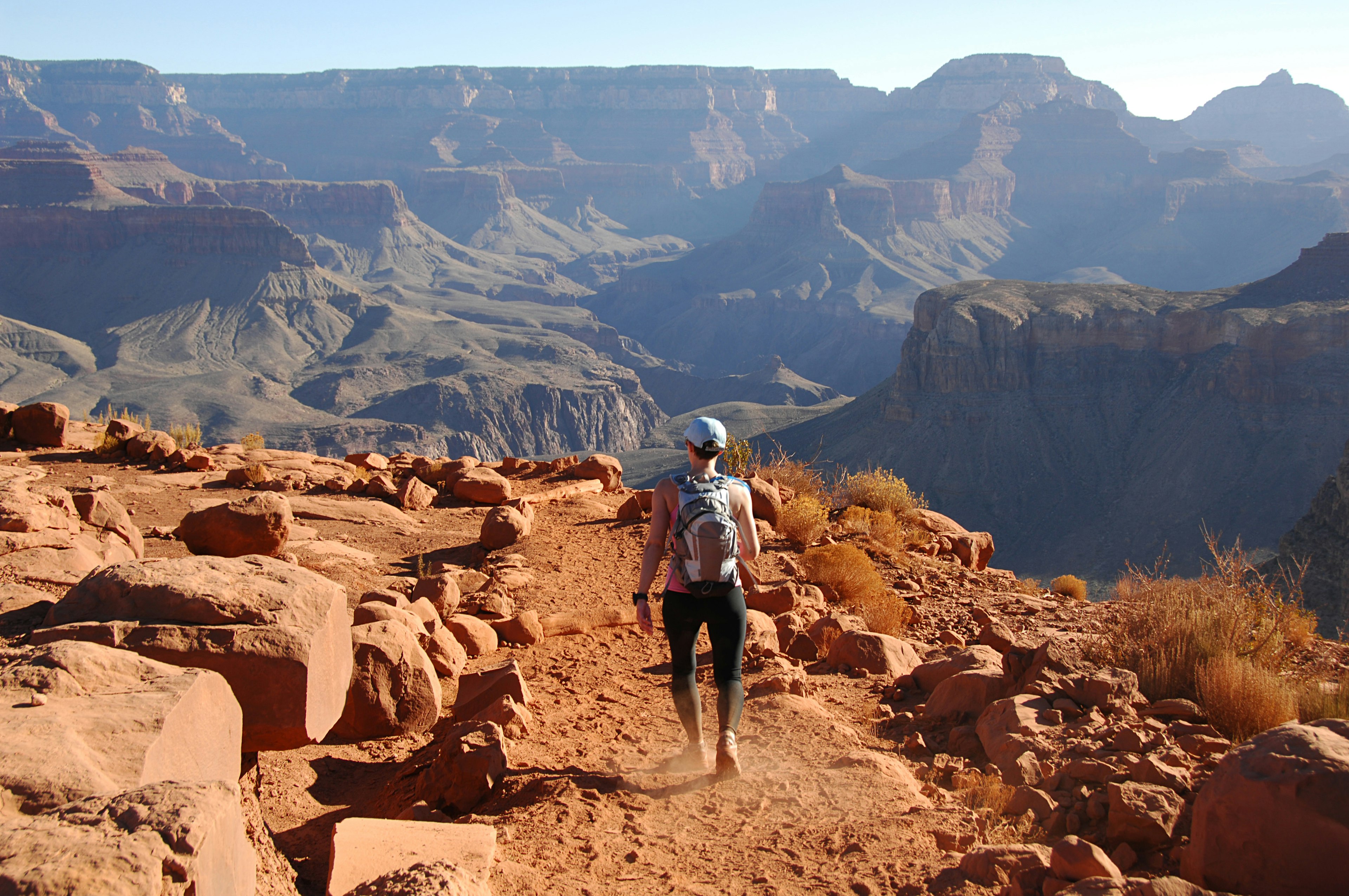 A woman hiking the South Kaibab Trail of the Grand Canyon