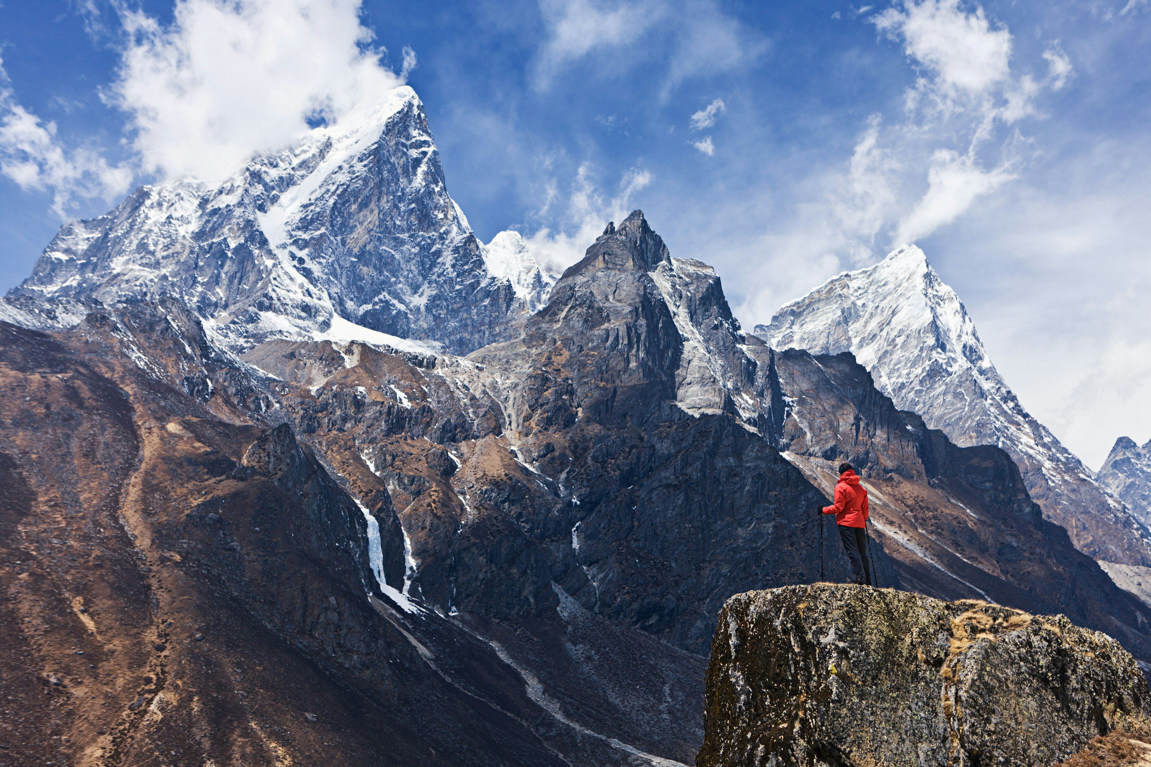 Woman looking at the mountains in Mount Everest National Park