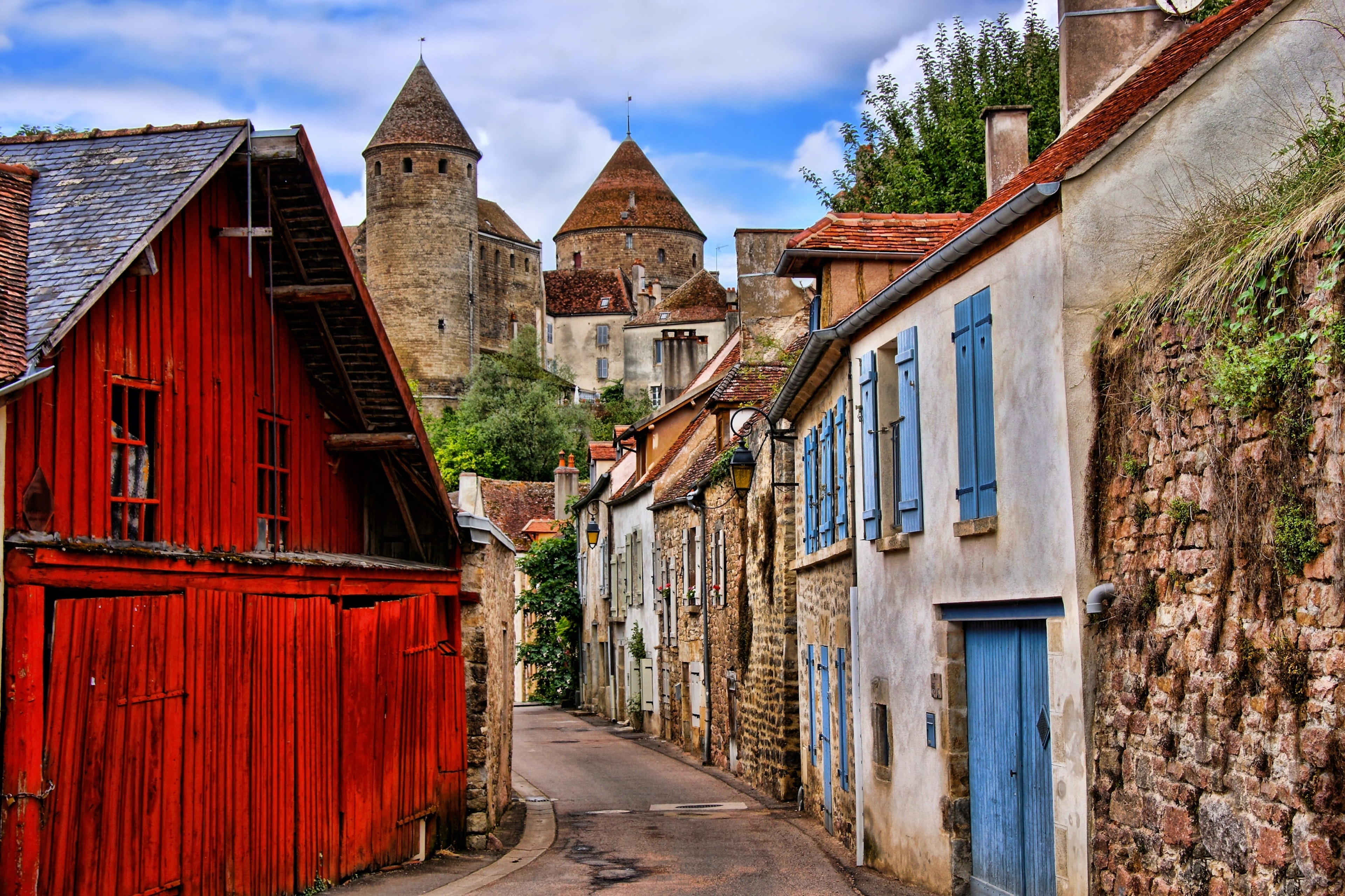 Beautiful Burgundy street with ancient towers, France