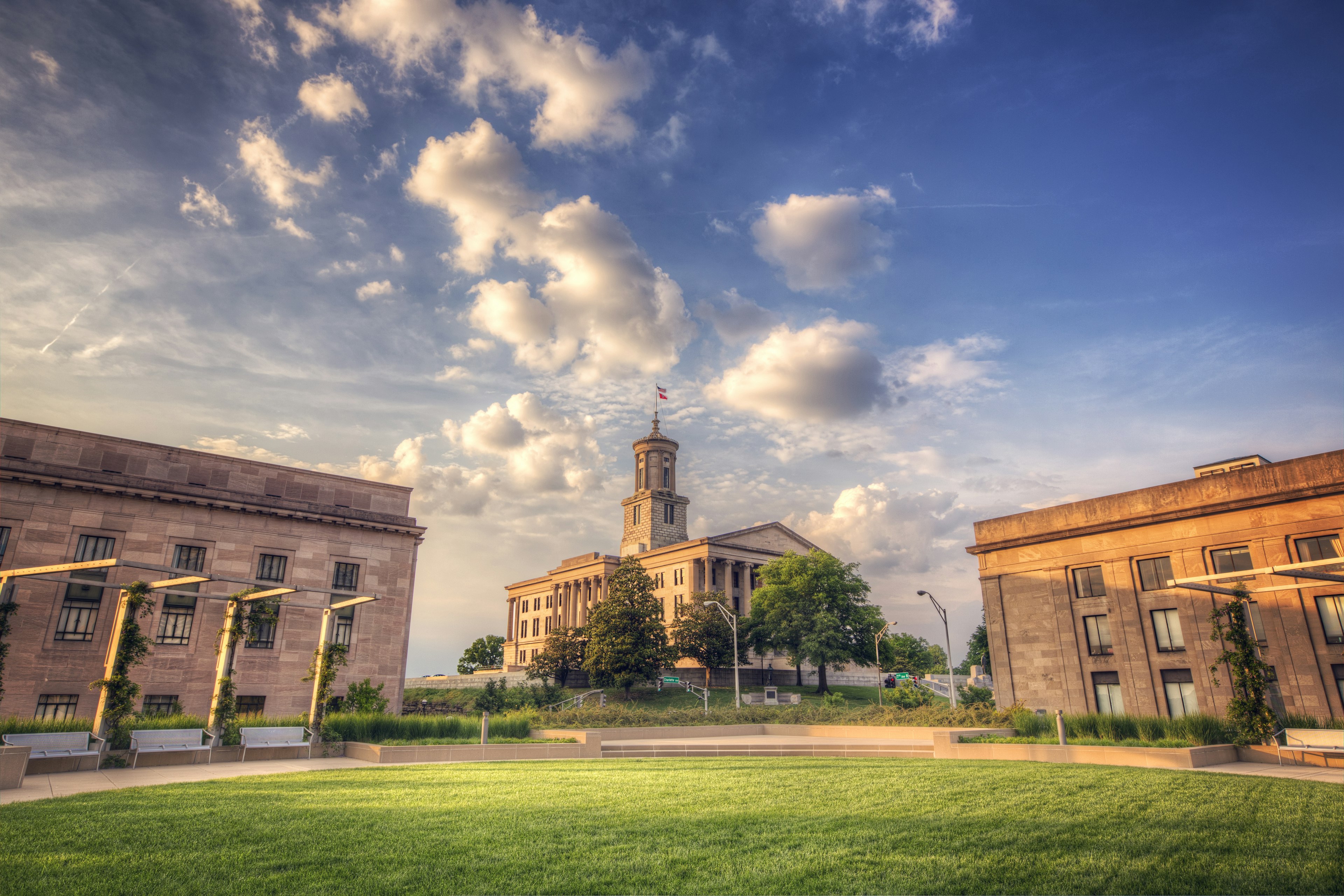 A grand government building stands on a hill