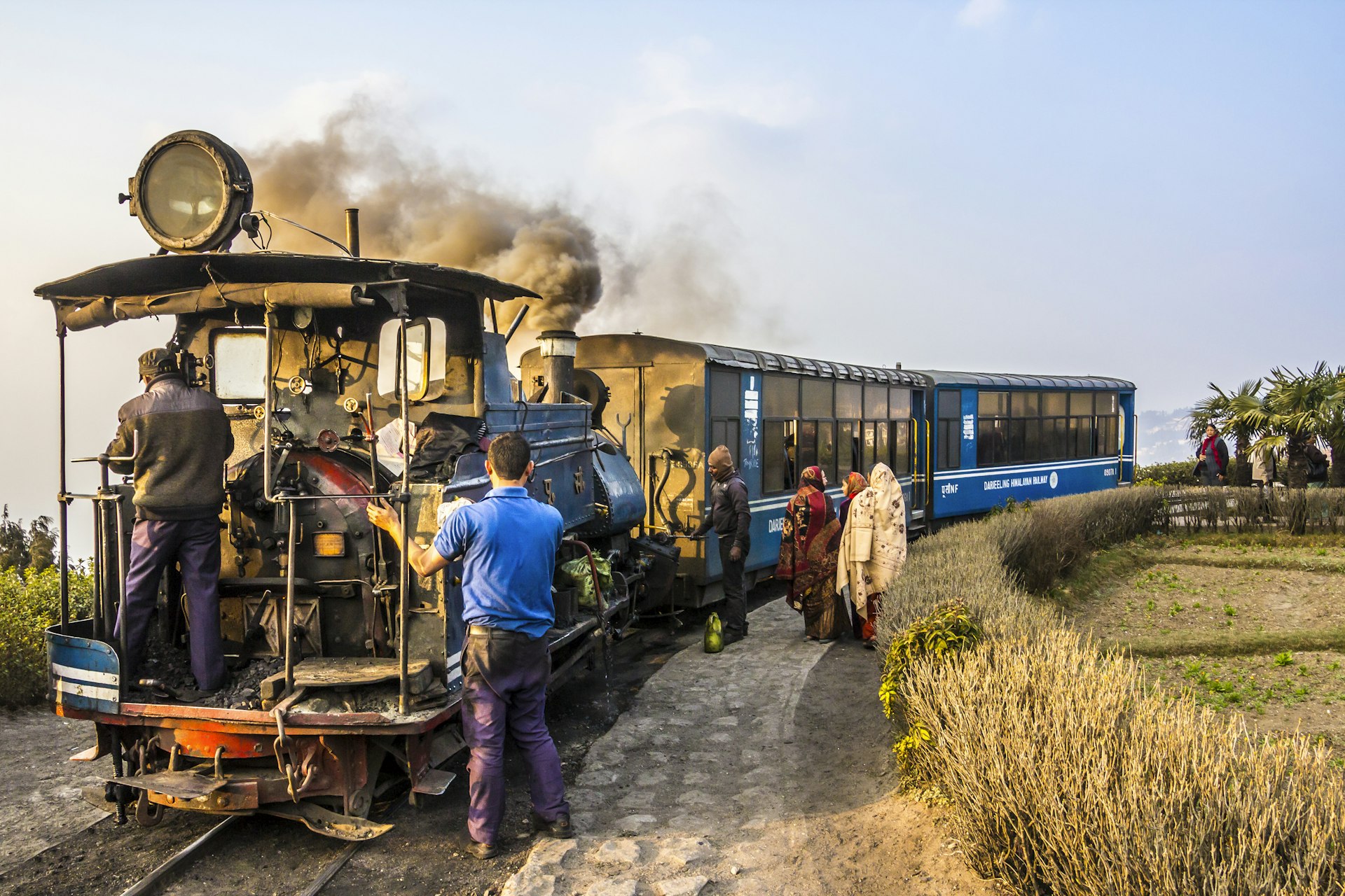 The Darjeeling toy train pausing at the Batasia Loop.