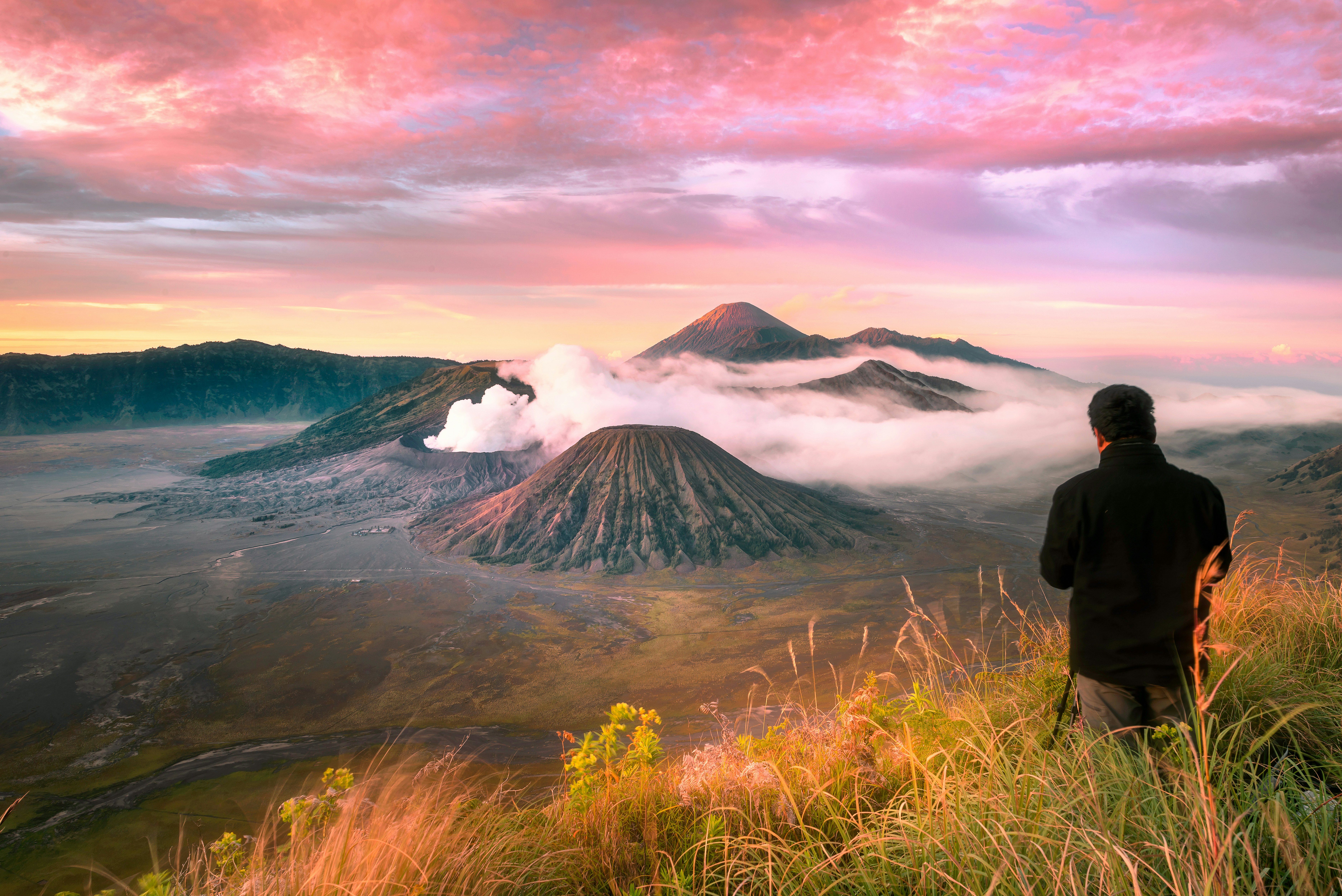 A photographer setting up a shot at volcano Mt. Bromo, Indonesia