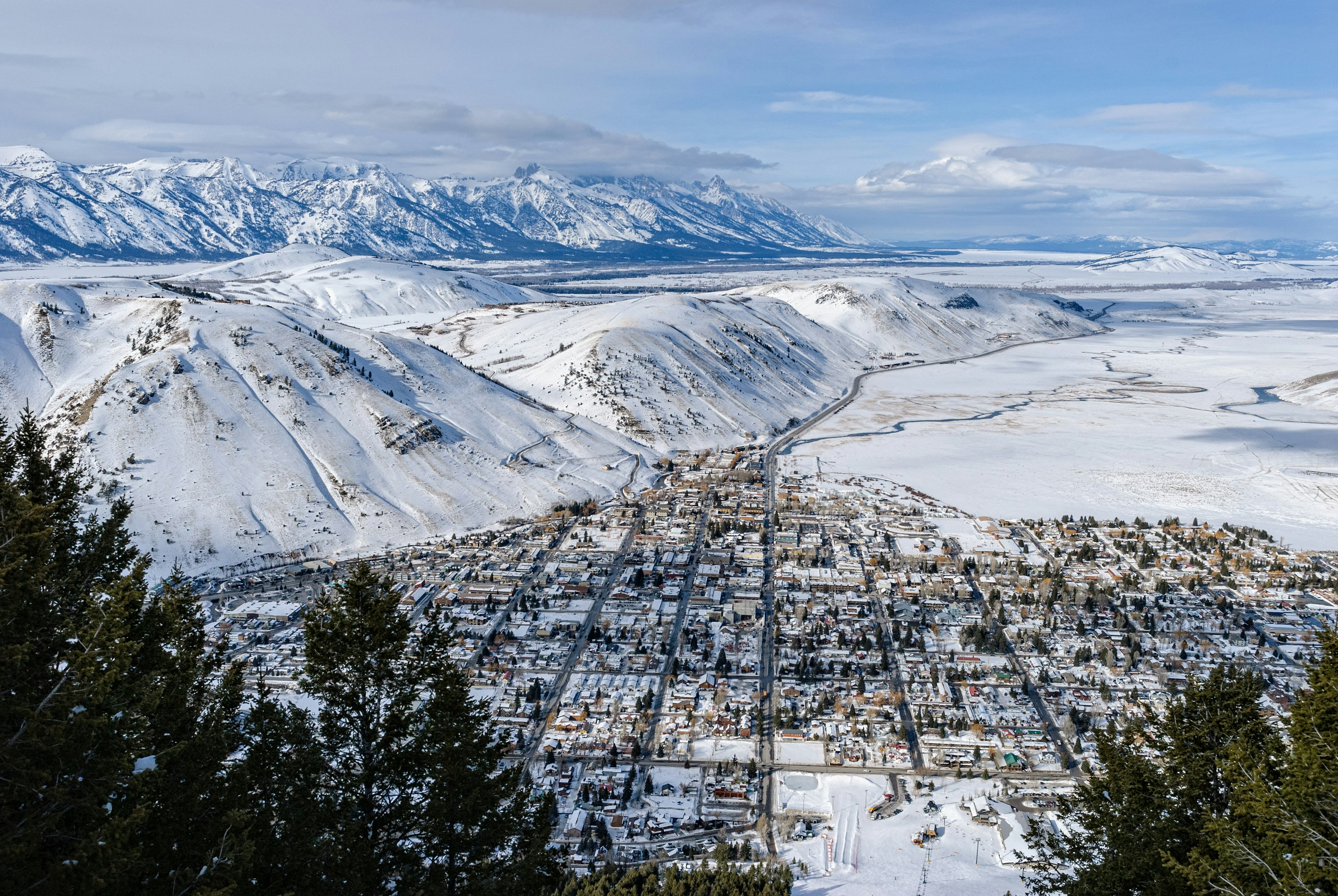 High-angle view of Jackson city covered in snow and Teton Valley