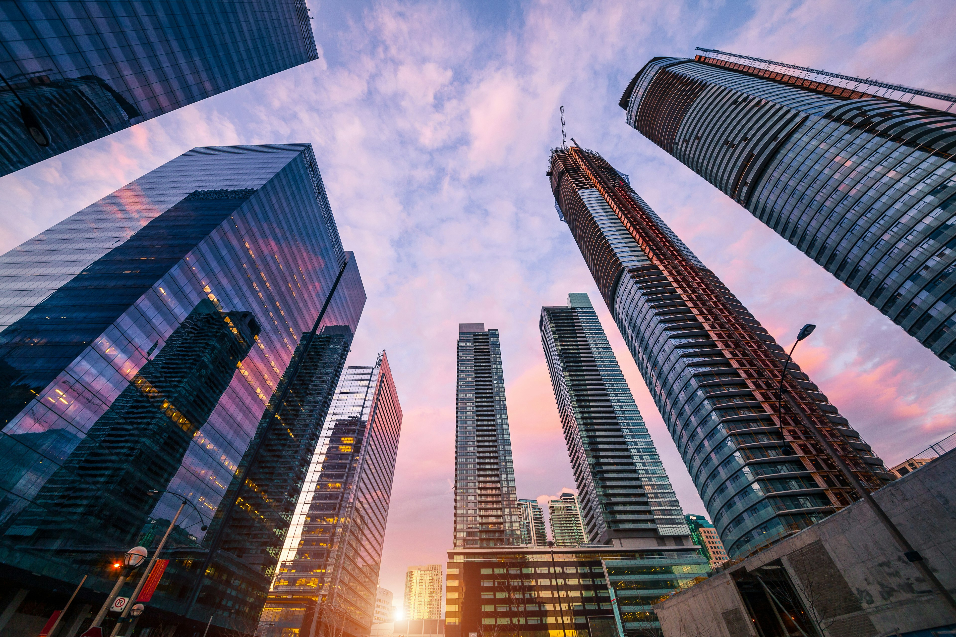 Modern skyscrapers of busy Toronto downtown
Built Structure City Cityscape Connection Communications Tower Architecture Travel Destinations Horizontal Outdoors Urban Skyline Low Angle View Canada Modern Famous Place International Landmark Sunrise - Dawn Sunset Toronto CN Tower Office Building Exterior Skyscraper Standing Out From The Crowd Surveillance Downtown District City Life Photography Dramatic Sky Capital Cities