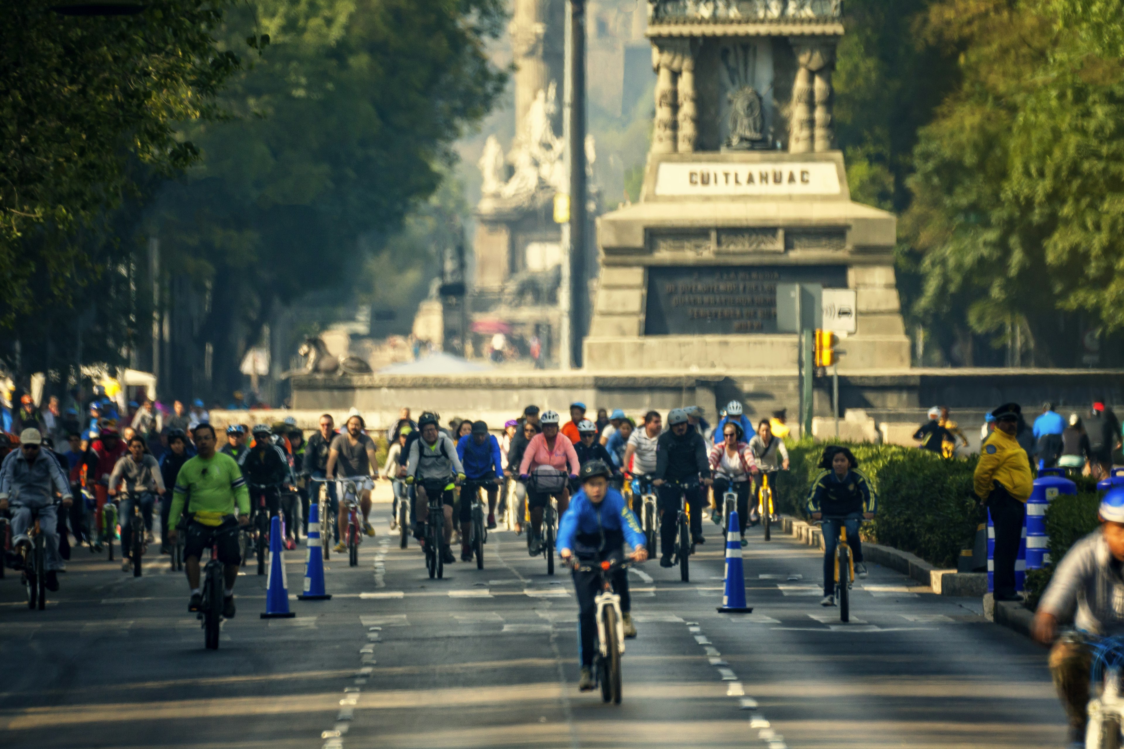 People ride bicycles on Reforma Ave in Mexico, Mexico