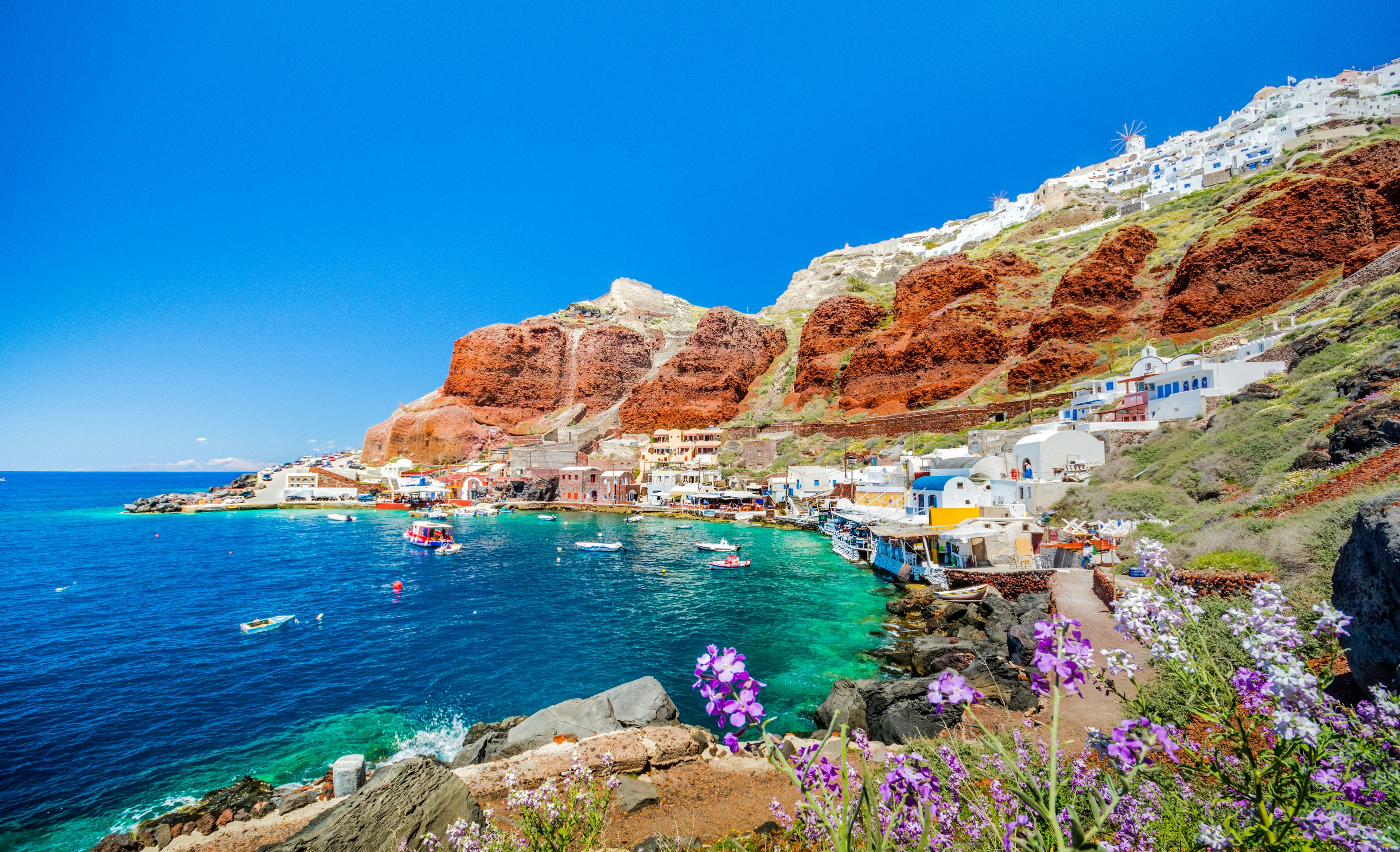 The old harbor of Ammoudi under the famous village of Ia at Santorini, Greece