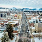 911026804
Aerial View; Architecture; Bozeman; Building Exterior; Built Structure; Business; Commercial Sign; Downtown District; Drone Point of View; Horizontal; Main Street; Montana - Western USA; Mountain Range; No People; Outdoors; Photography; Retail Place; Small Town; Small Town America; Snow; Store; Tourism; Travel Destinations; USA; Winter;
Aerial view of Main Street in Bozeman Montana. Landscape is blanketed in snow with the mountain range in the distance with landmarks and well know buildings in view in the foreground.