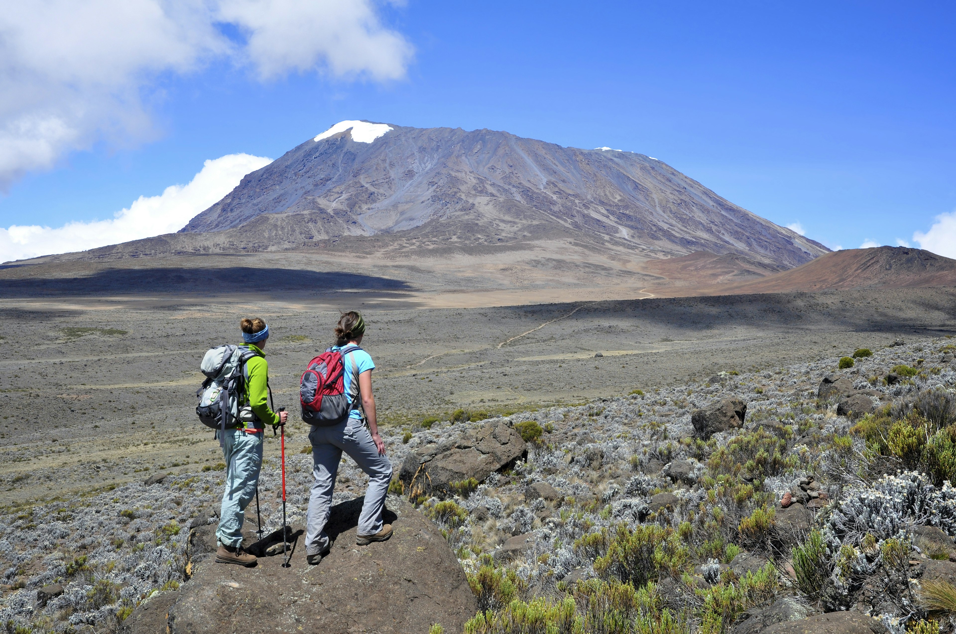 Two women hiking Mt Kilimanjaro via the Marangu Route