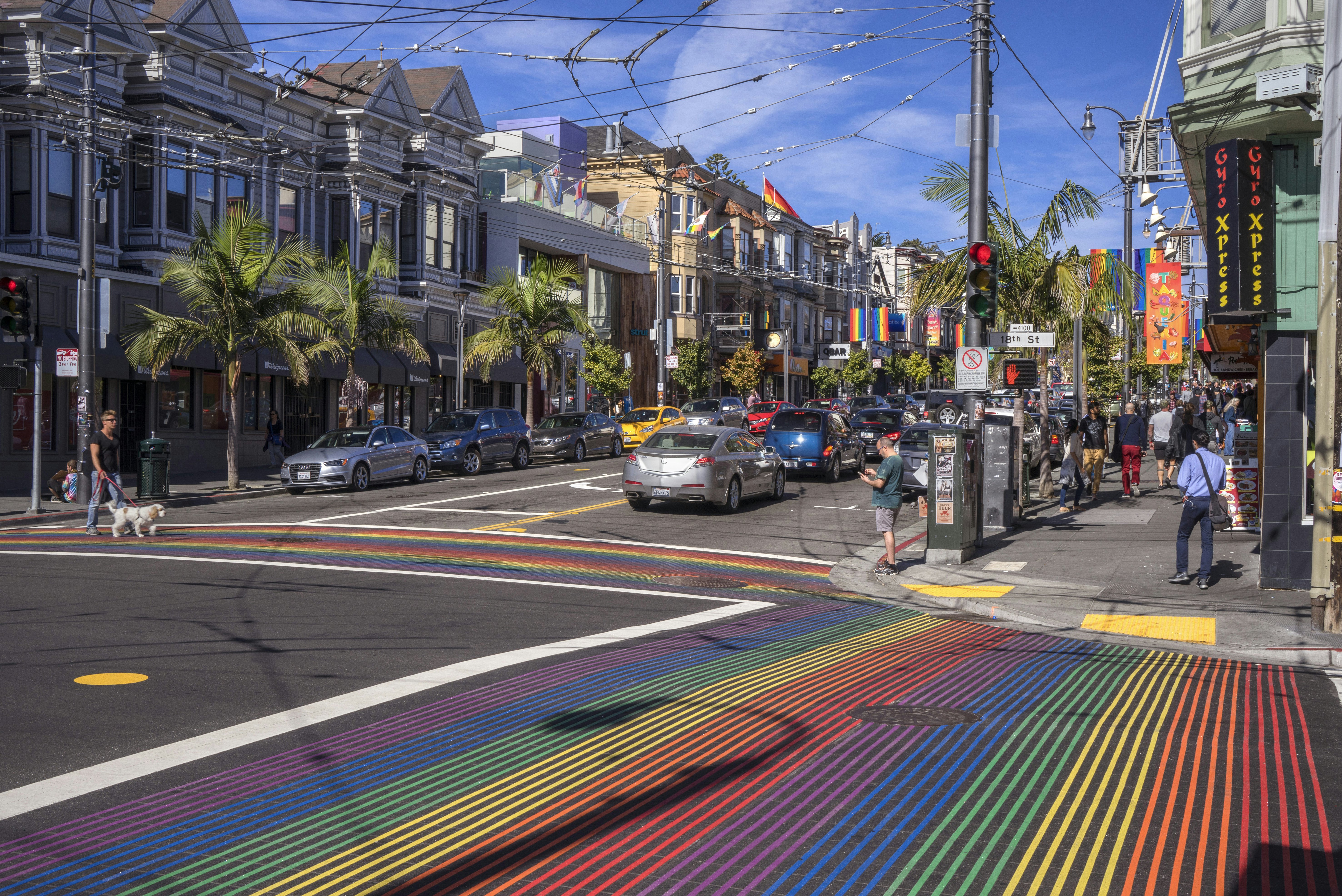 Rainbow pedestrian crossings at the intersection of 18th St and Castro Street, San Francisco