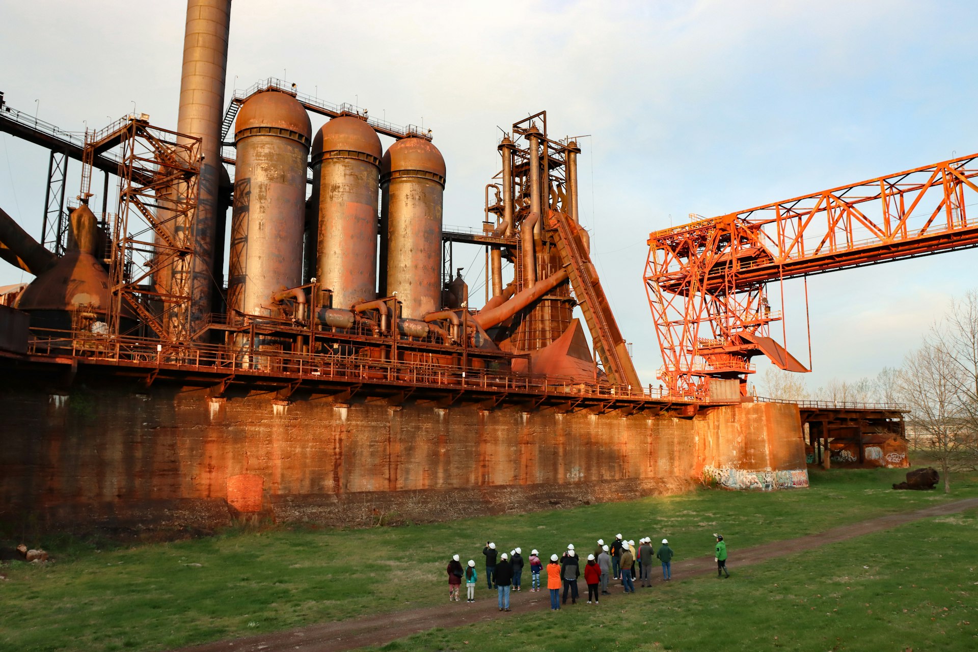 Visitors gaze up at the massive Carrie Blast Furnaces, once part of a giant steel works on the Monongahela River in Pittsburgh