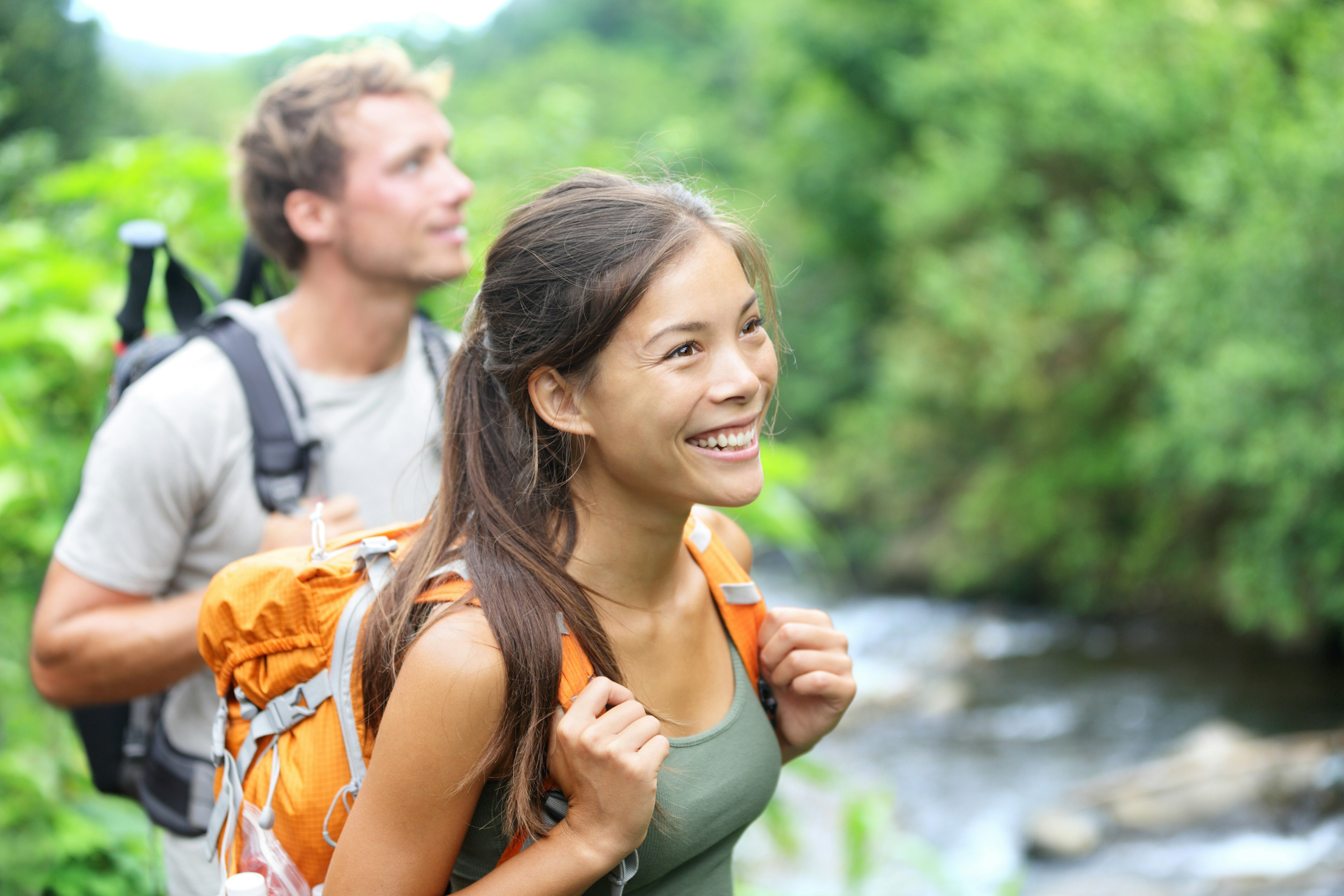 People hiking - happy hiker couple on Hawaii